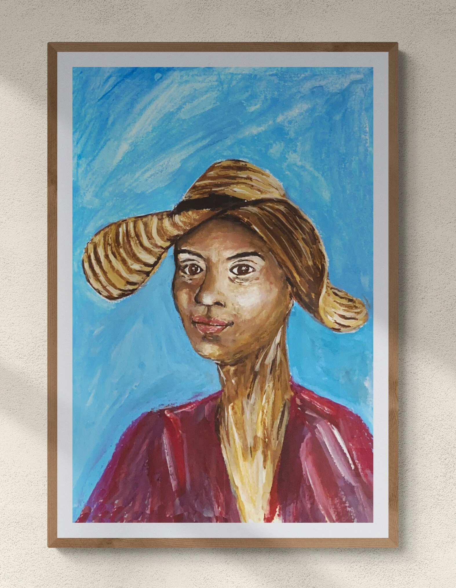 woman in big sun hat and red top on blue background framed hung on wall.jpg