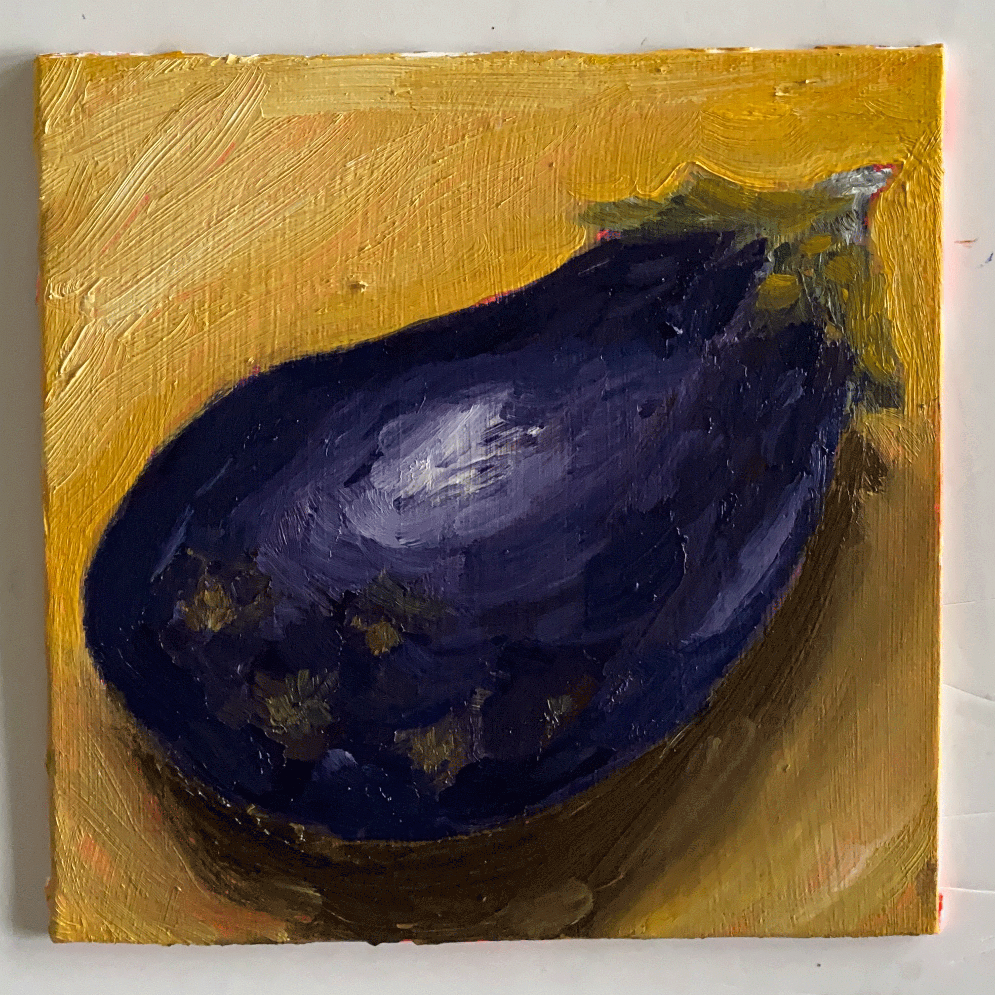 eggplant on yellow background.png