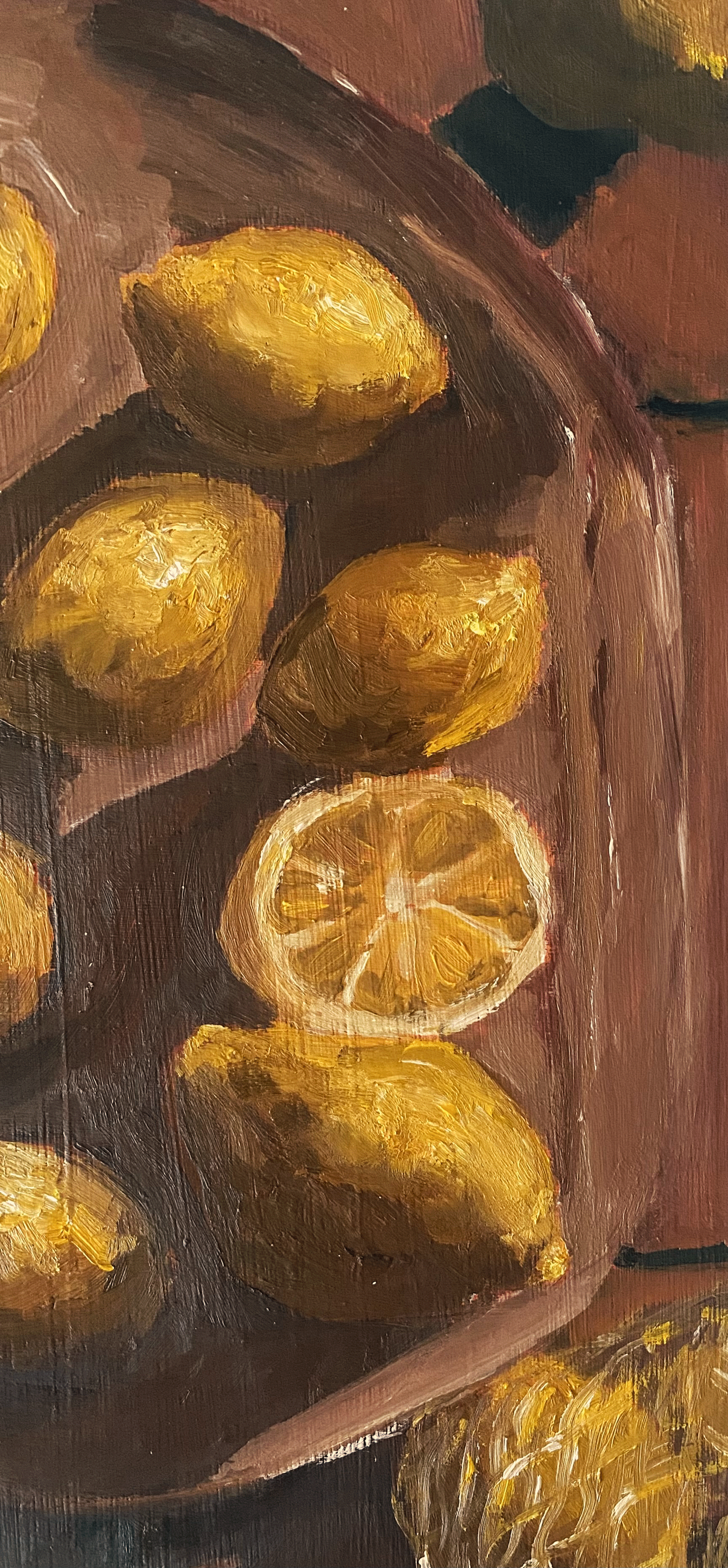 close up of lemons on wood table.png