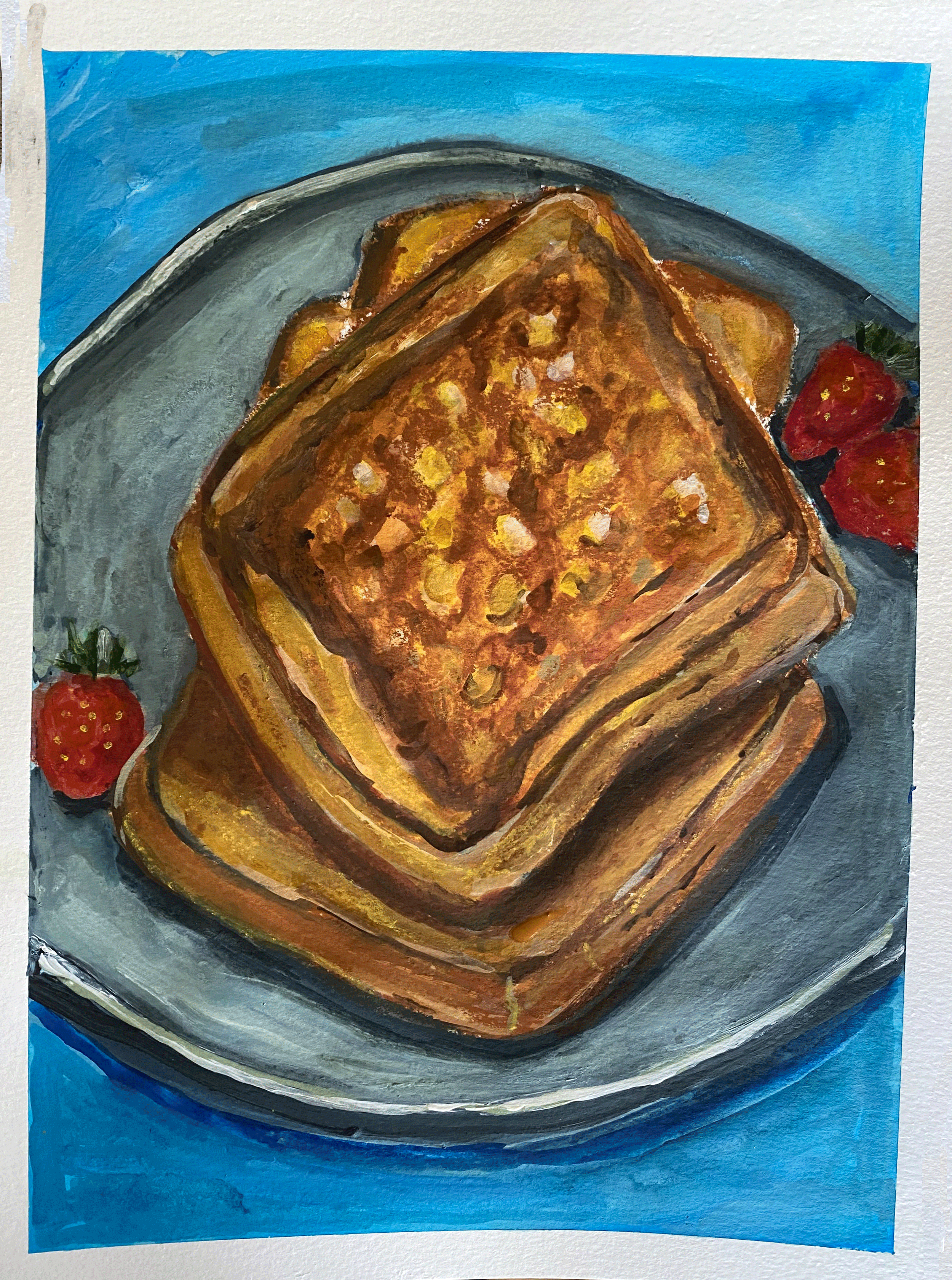 French toast on grey plate on blue background.png