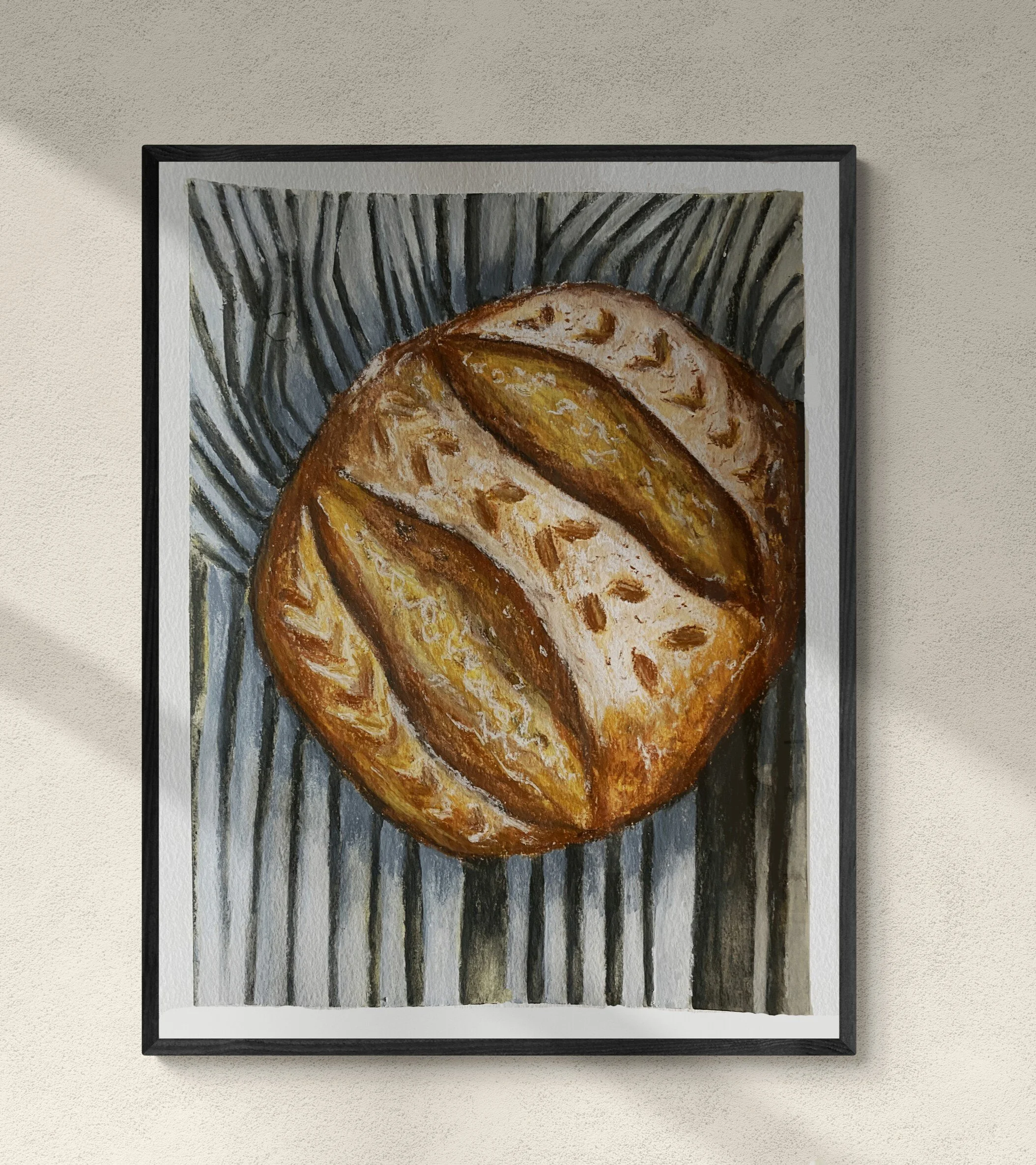 sourdough bread on gingham tea towel framed artwork hung on wall.jpg