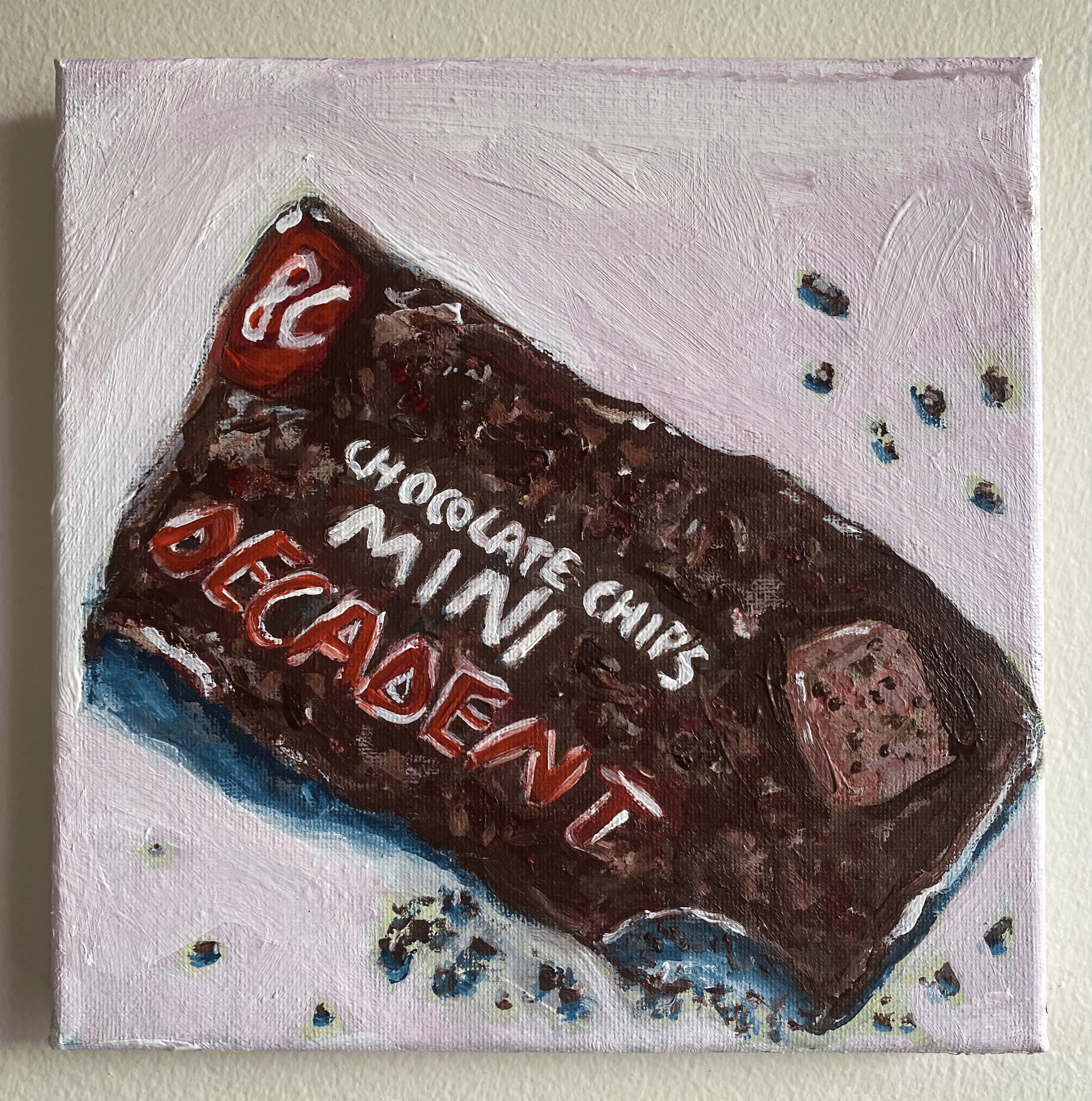 brown bag of semi sweet chocolate chips with red and white lettering on white background hung on wall