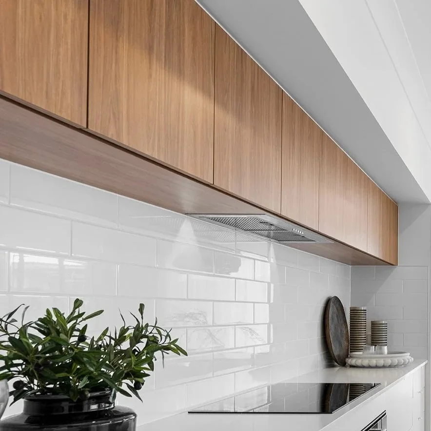   Overhead Cabinetry    
Continuous overhead joinery design with undermounted rangehood. Matt finish laminate colour as per nominated palette.