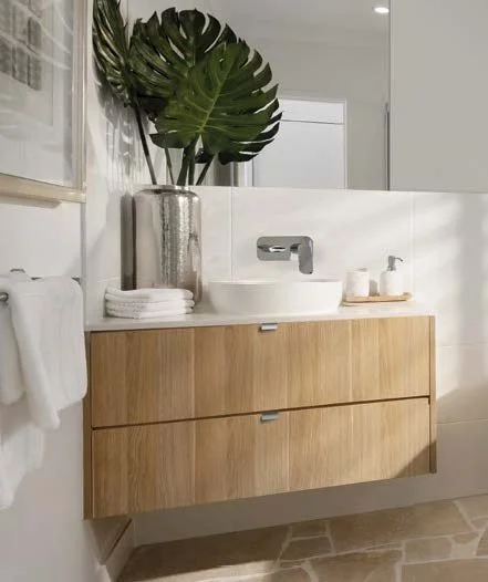 Designer floating wall hung vanity design with 2 drawers. Laminate as per nominated palette
concept. Note: Internal U-shape design to accommodate plumbing.