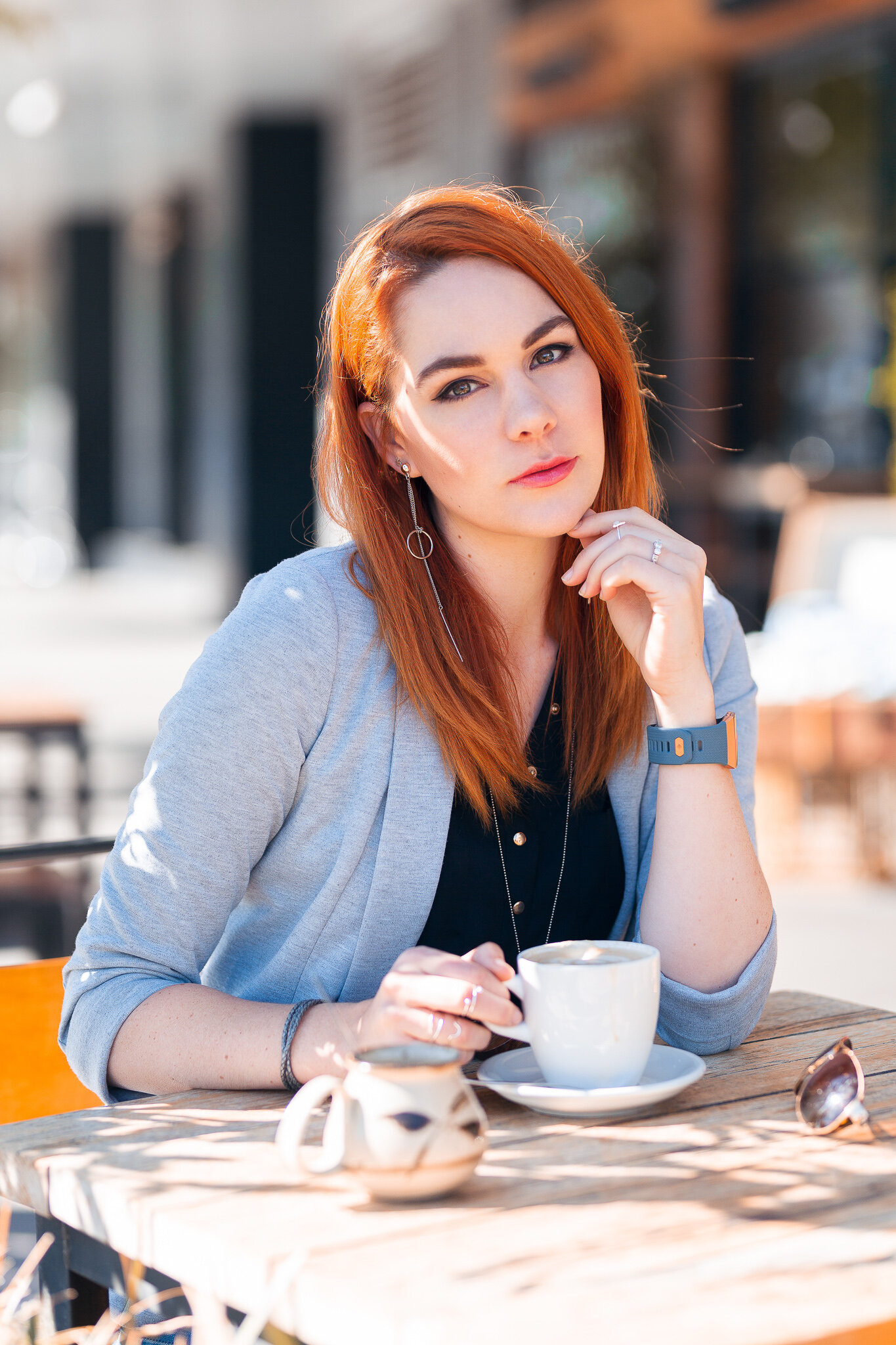 Canberra Branding Photography - Woman sits in cafe with coffee