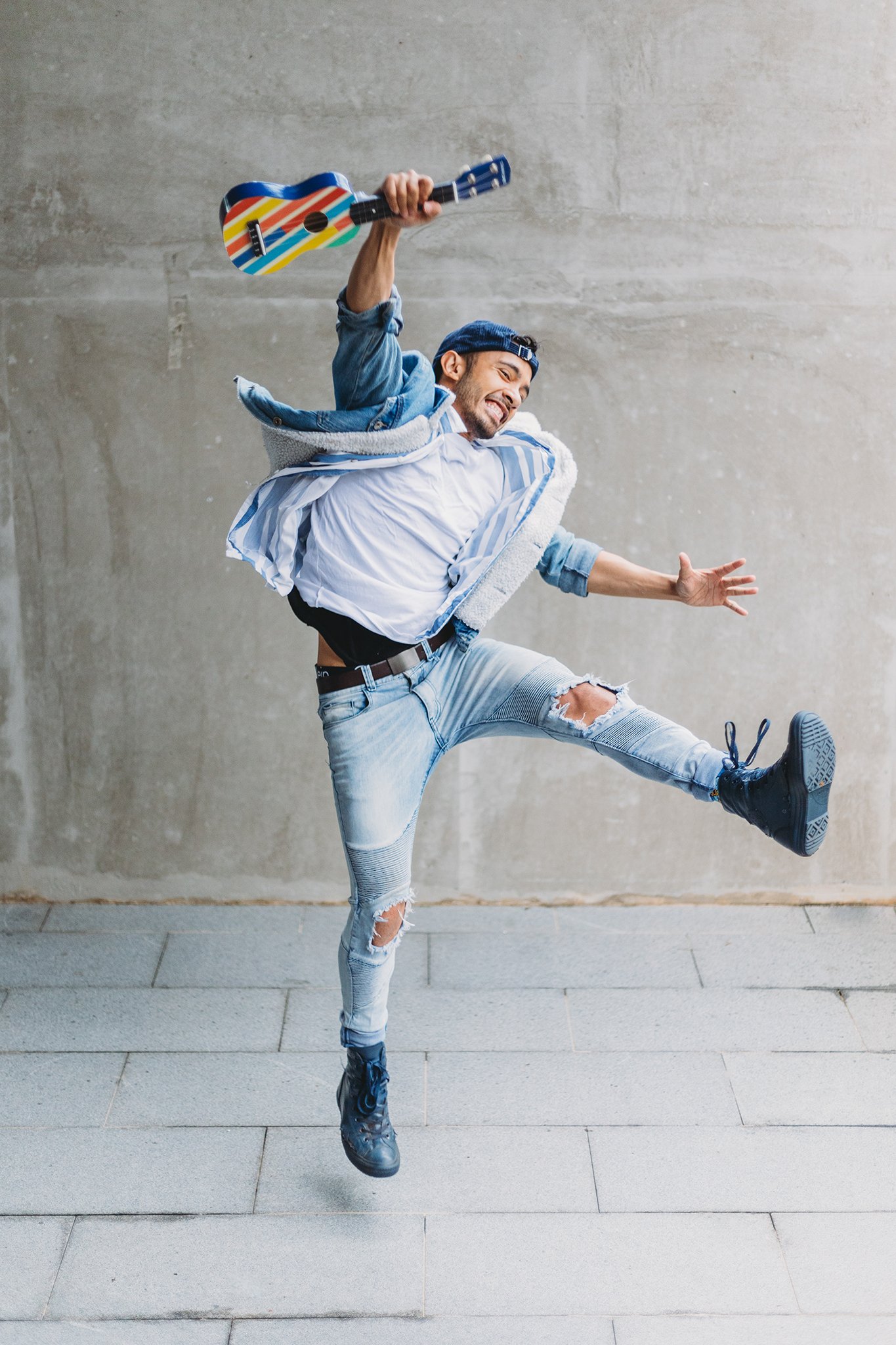 Canberra Branding Photography - man jumps with ukelele