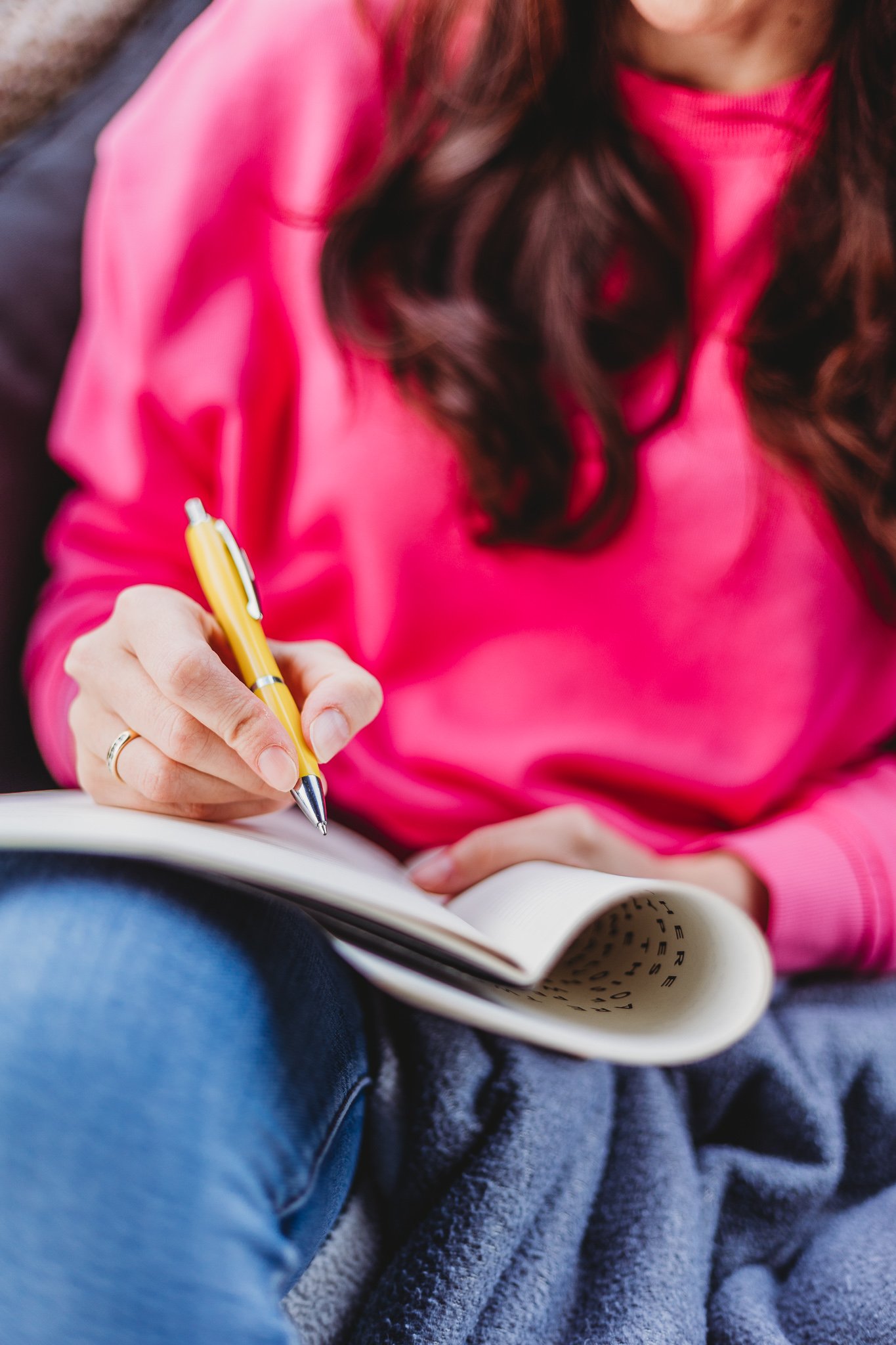 Branding photography - woman writes in notebook