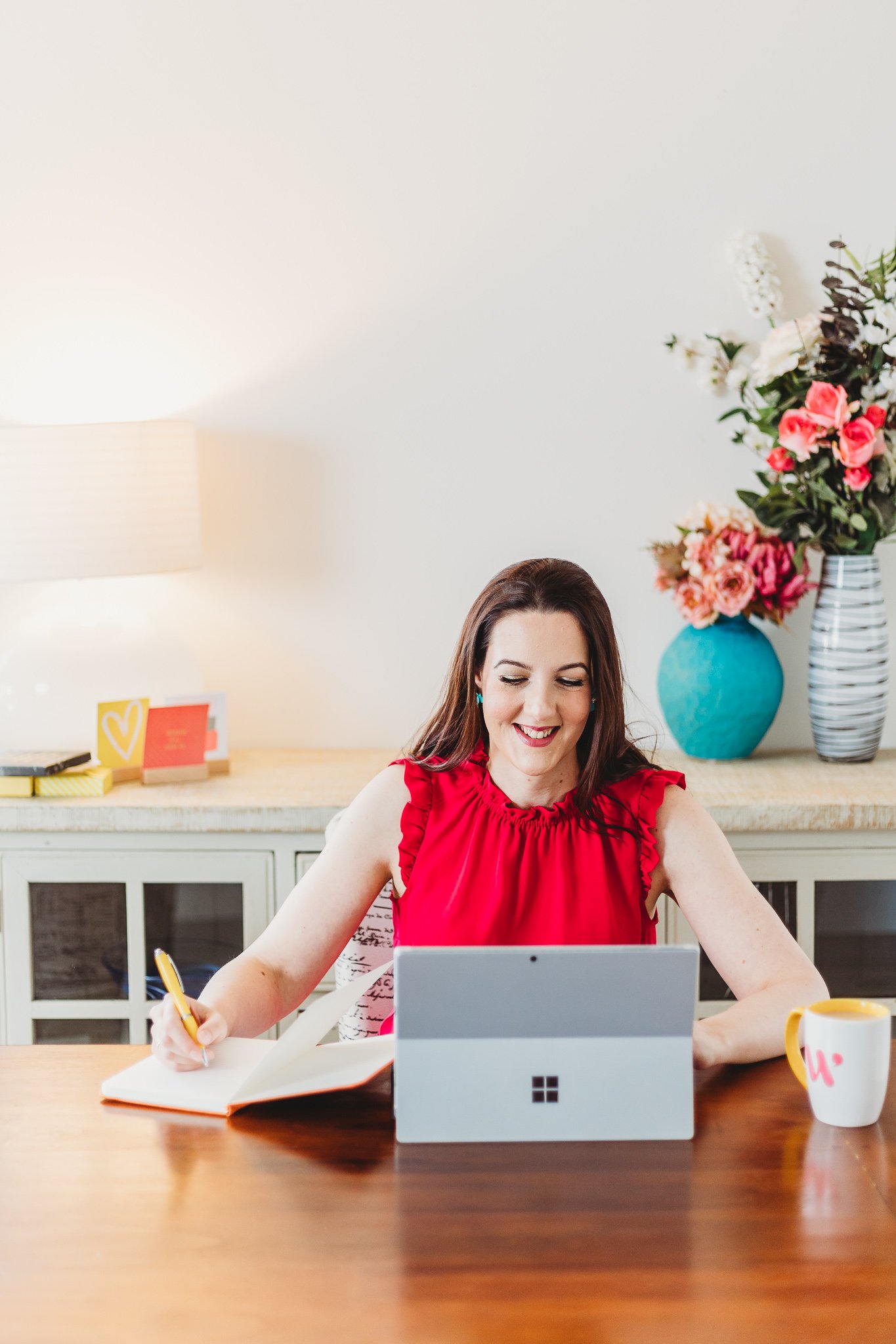 Branding photography - woman writes in notebook