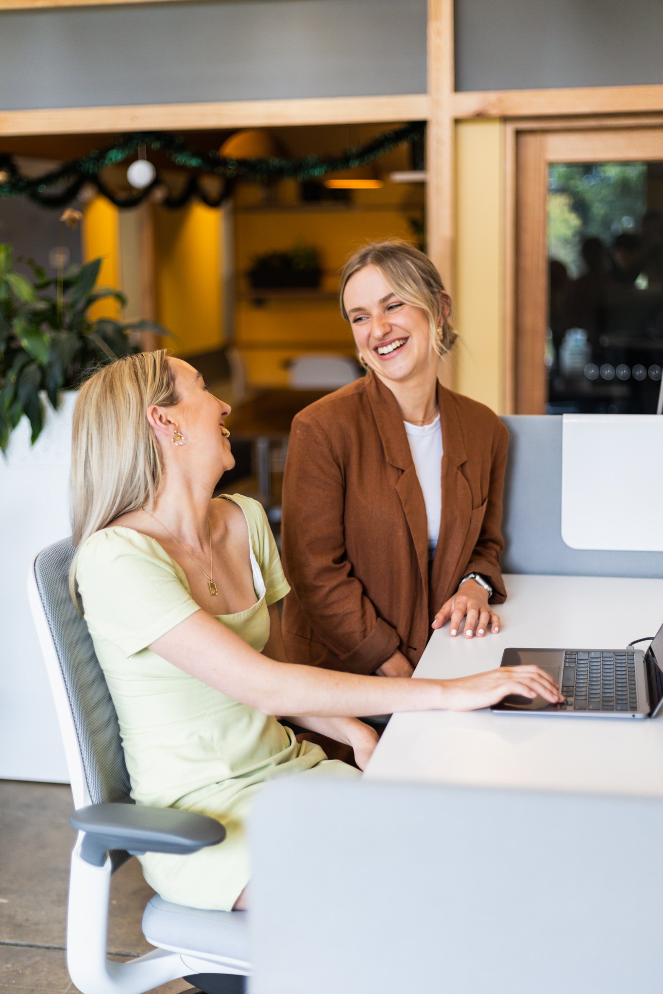 Canberra branding photographer - women laughing in office