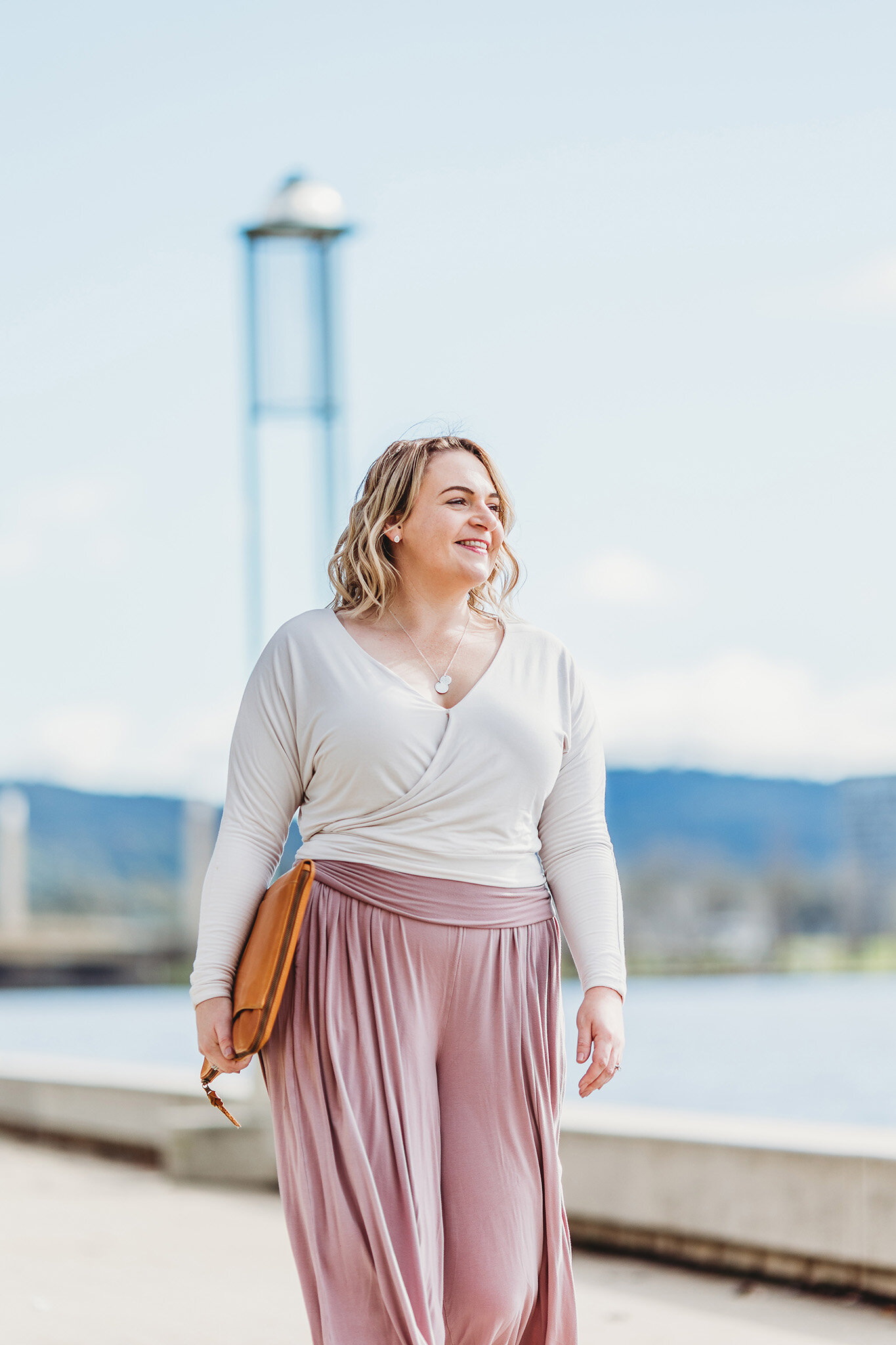 Woman walking by lake