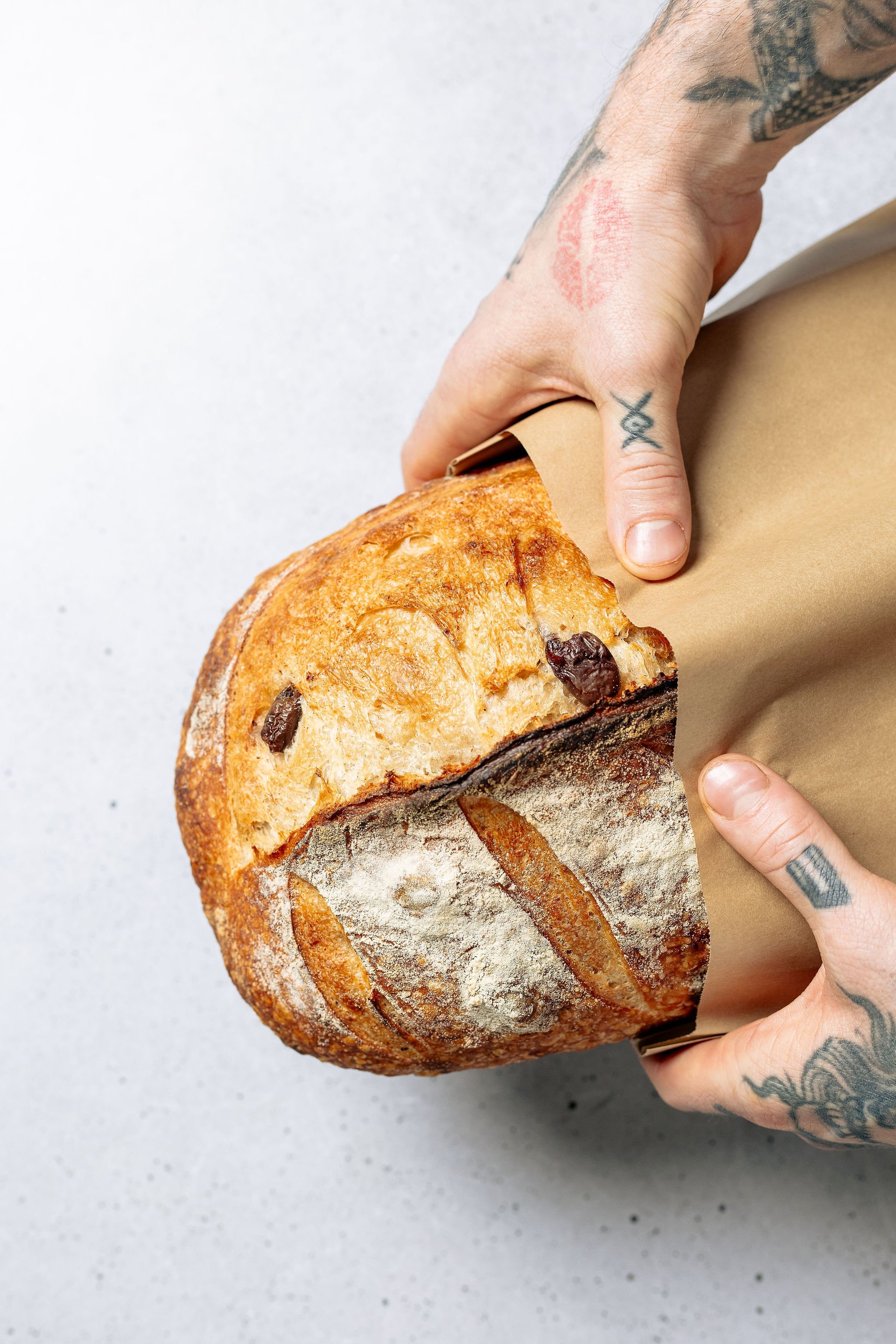 Canberra food photographer - hands hold sourdough