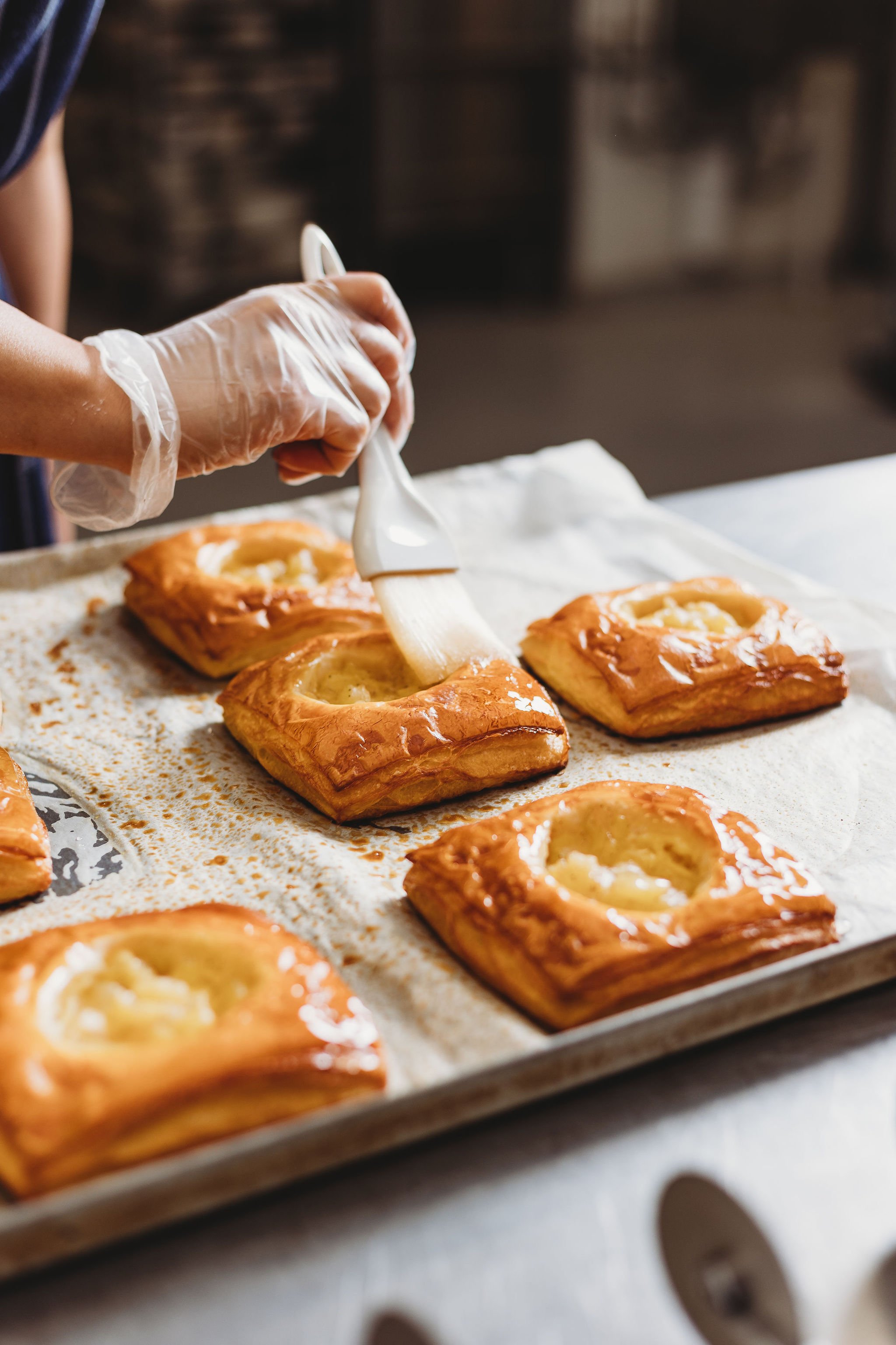 Canberra food photography - brushing oil on pastry