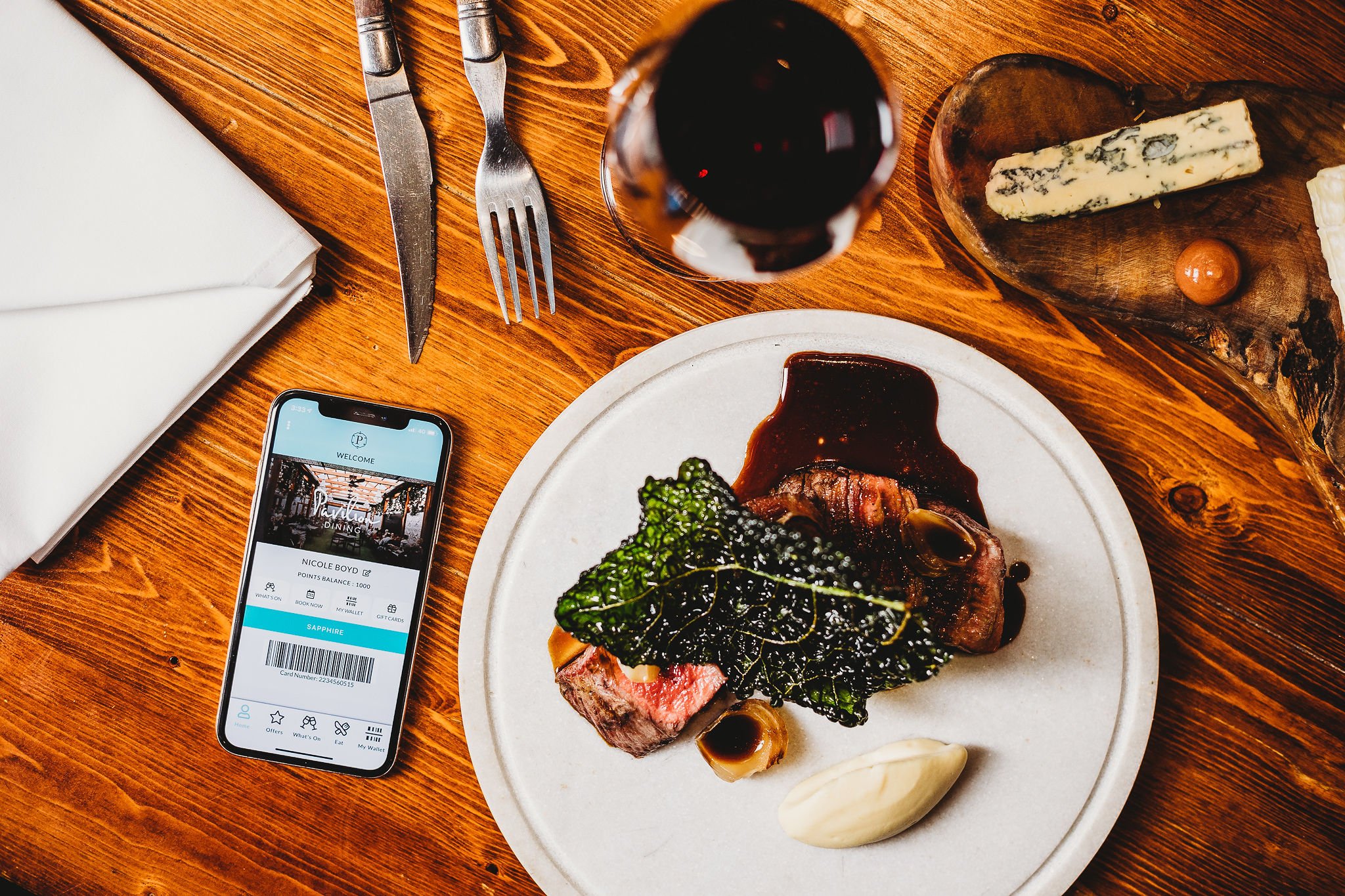 Canberra food photography - app open on phone next to plate (Copy)