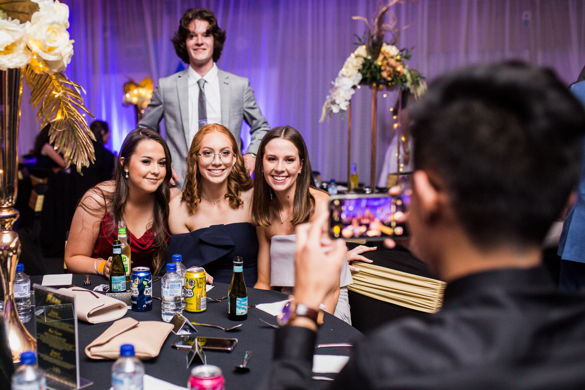 Canberra Formal Photography - Man takes photo of friends at school formal