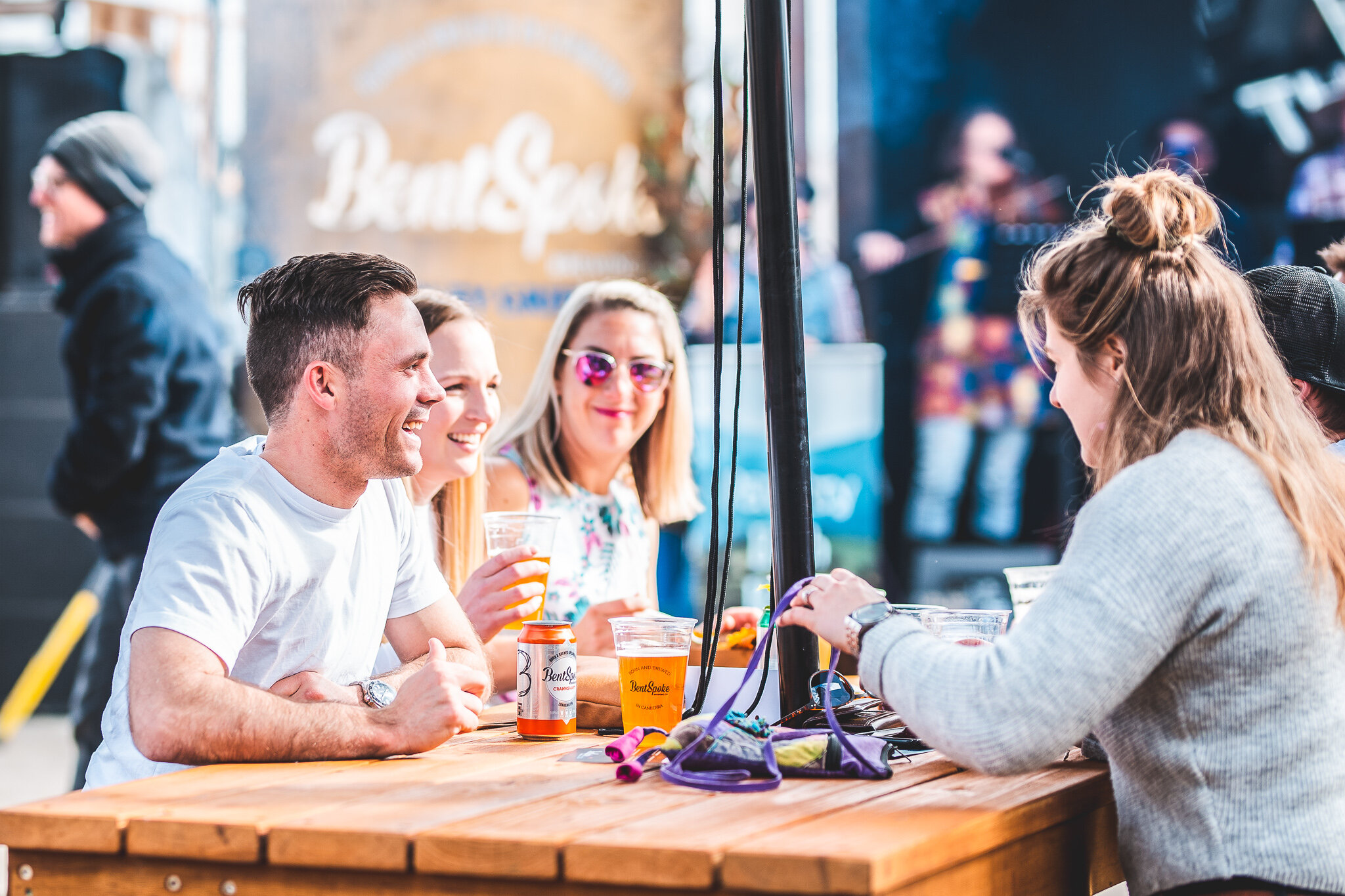Canberra Event Photography - Friends in sunshine drinking beer