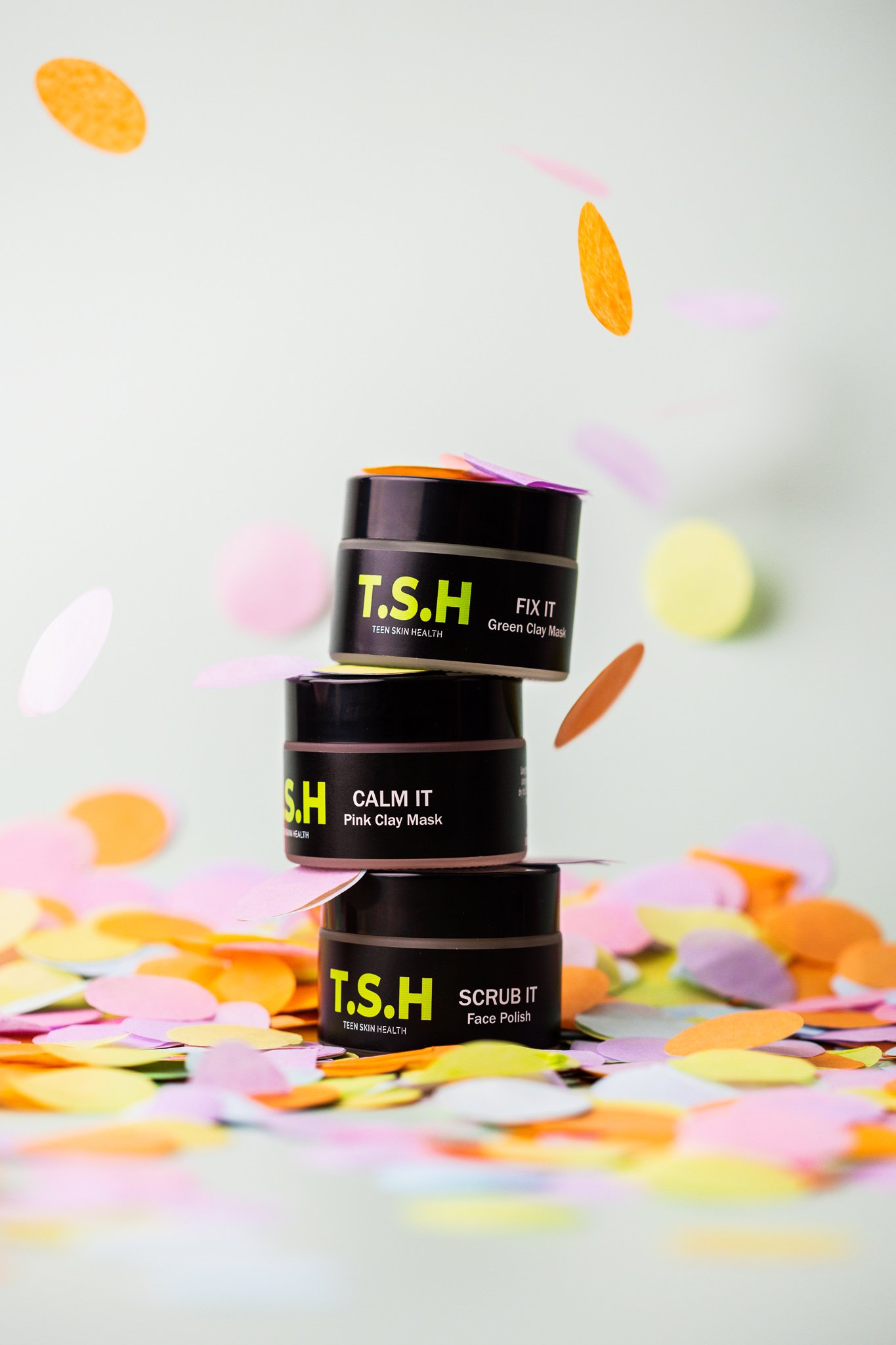 Canberra product photographer - skincare products with confetti falling