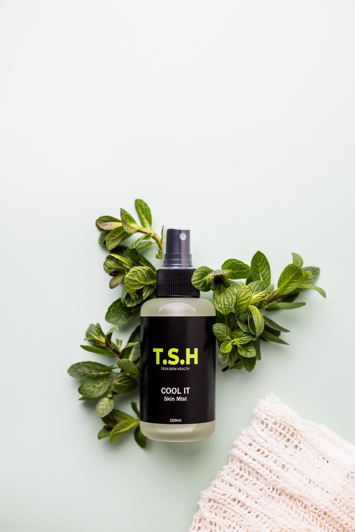 Canberra product photographer - skincare product with mint