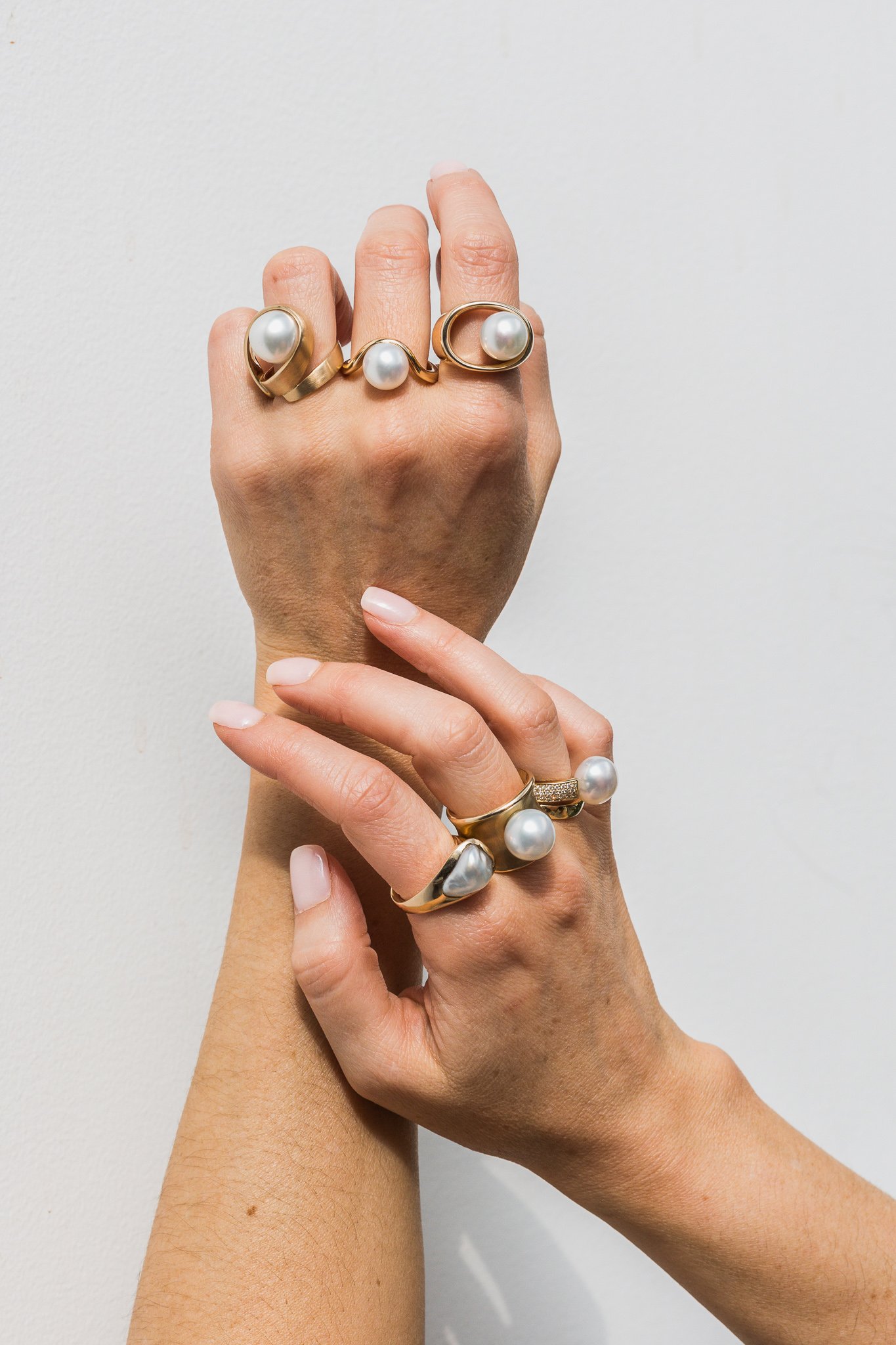 Canberra product photographer - female hands wear assorted rings