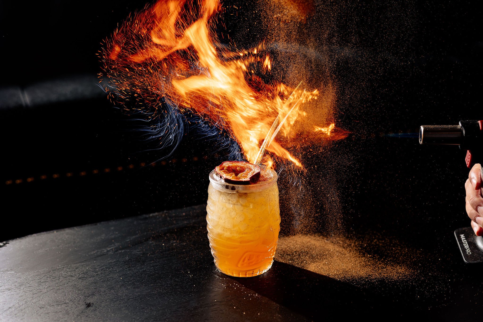 Canberra food photographer - flames and sparks over cocktail