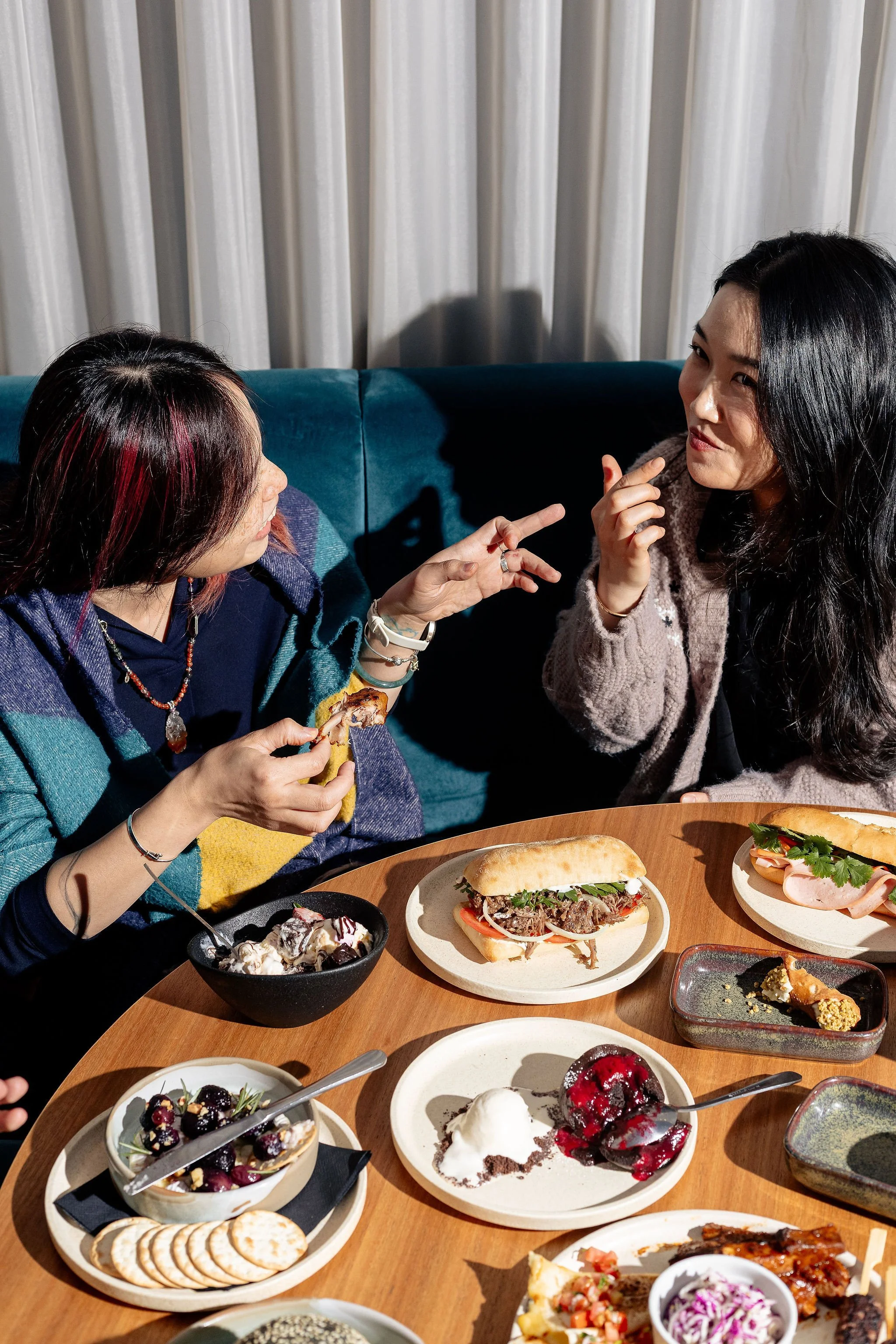 Canberra food photography - friends enjoying meal together