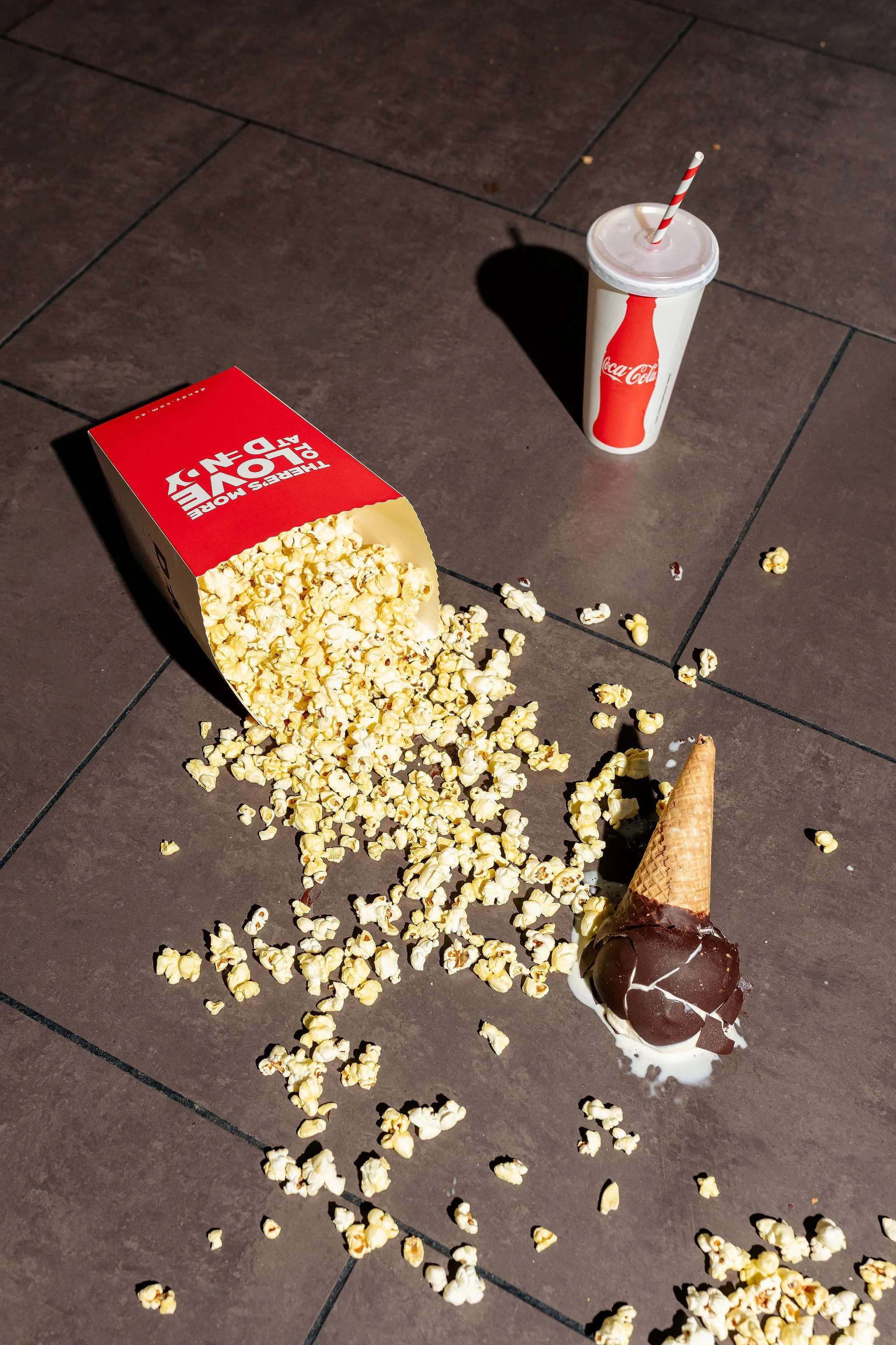 Canberra food photography - popcorn spilled on ground