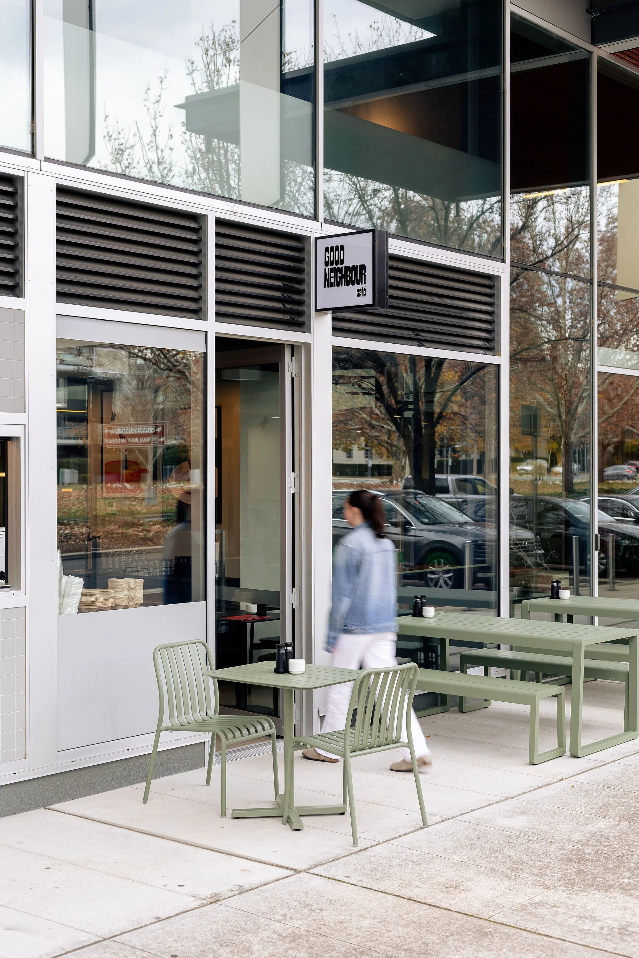 Canberra food photography - woman walks into cafe