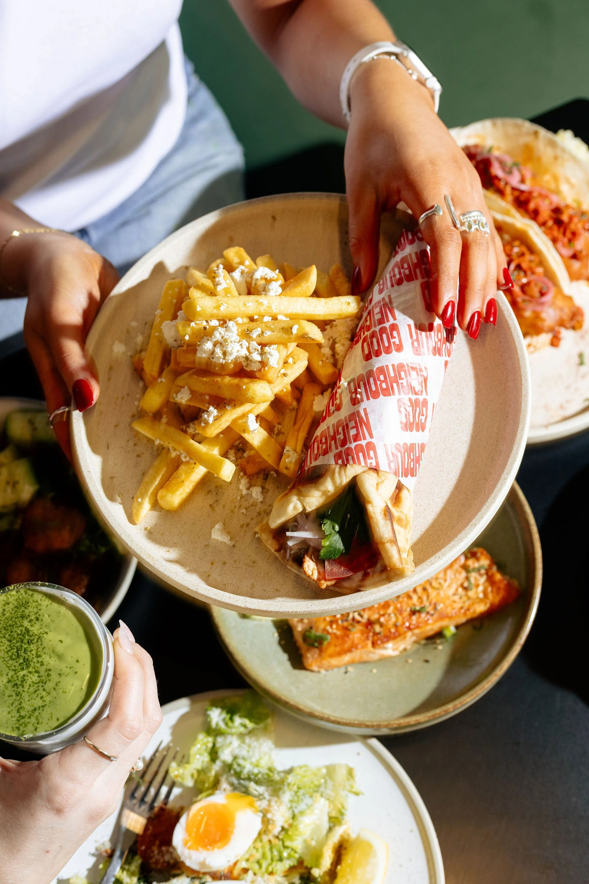 Canberra food photography - hand holds food