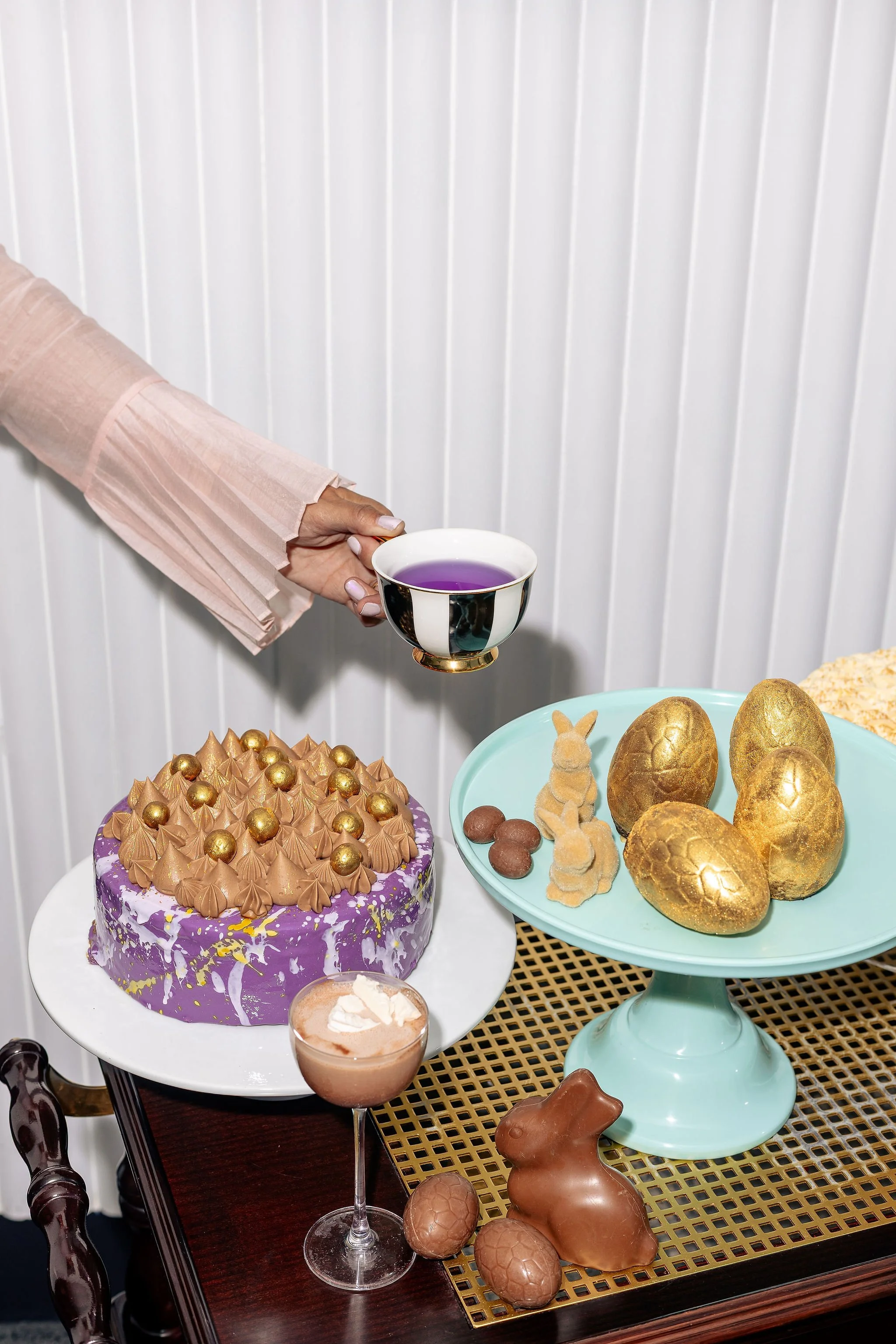 Canberra food photographer - woman's hand reaches for teacup