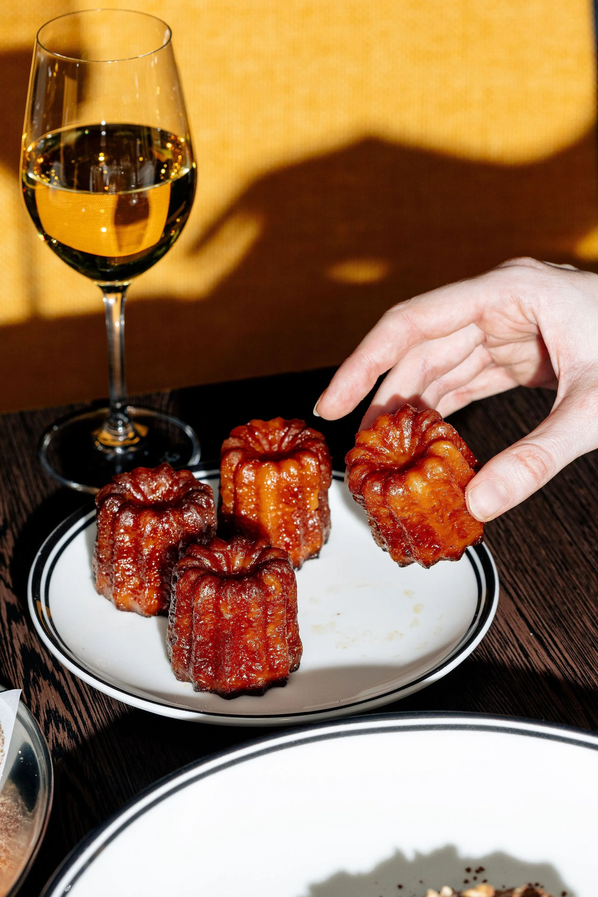 Canberra food photography - hand reaches for canale