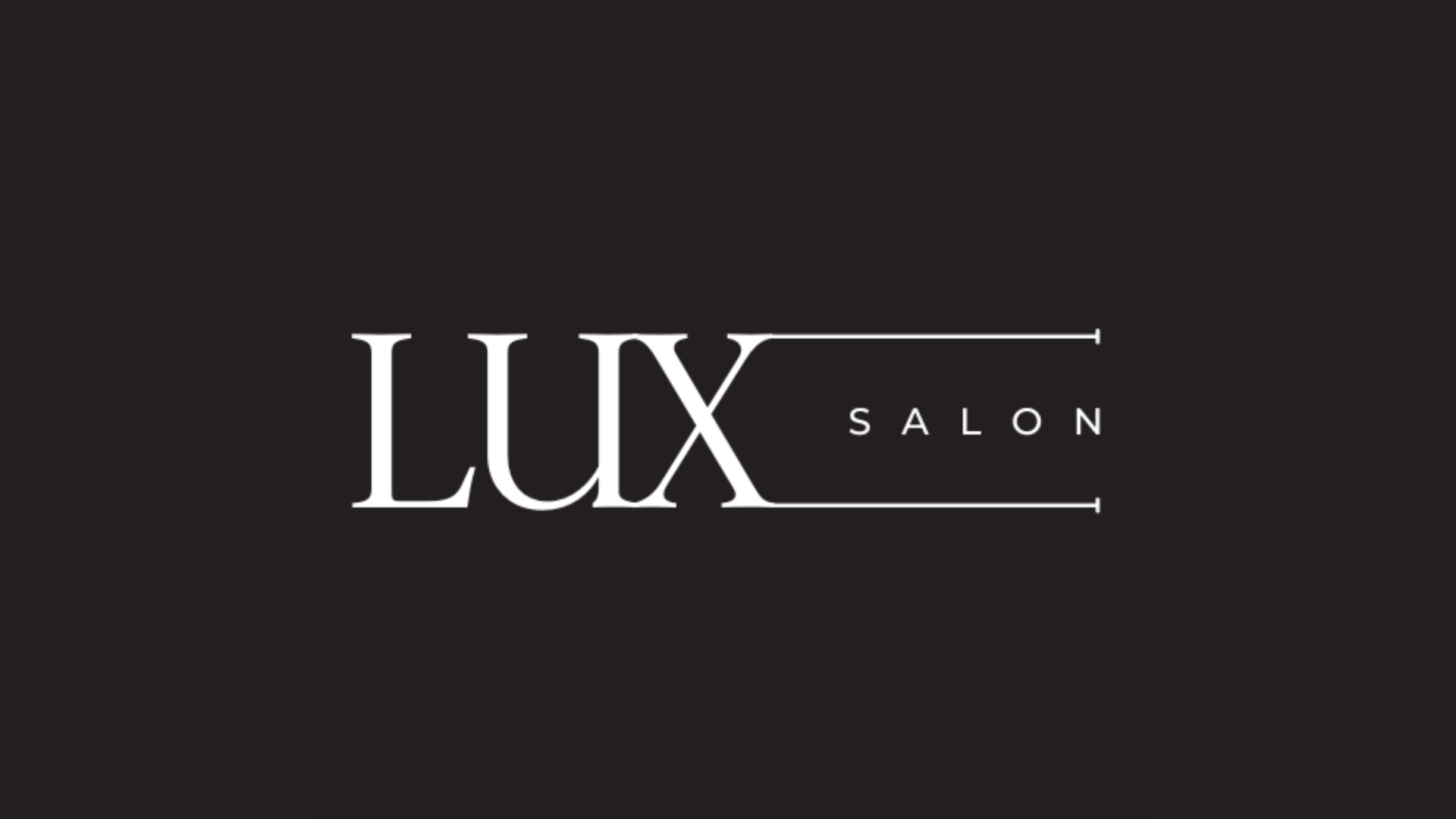 Lux Salon logo in white text on a black background.