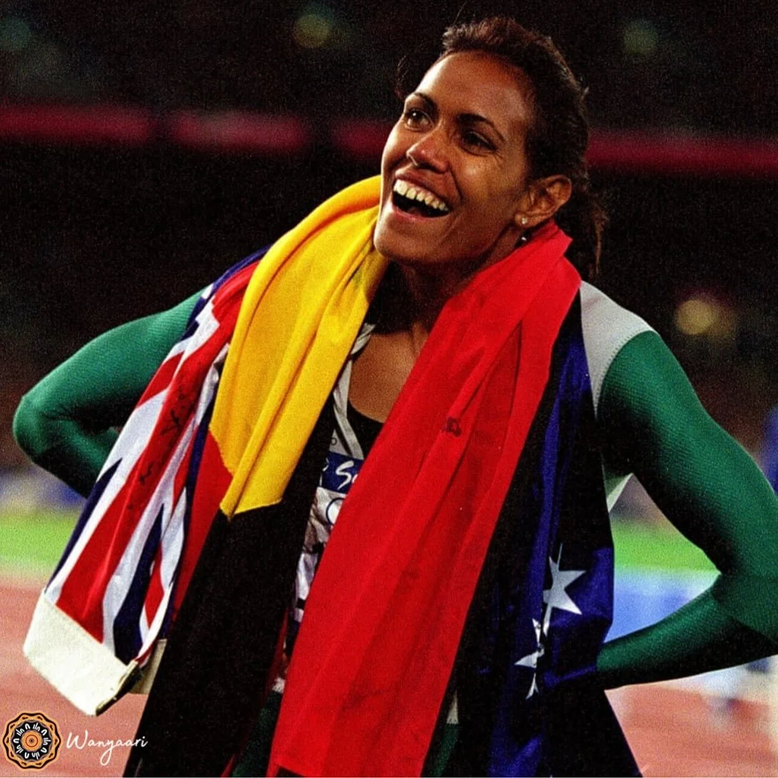 On 25th September 2000, proud Kuku Yalanji woman Cathy Freeman made history at the Sydney Olympics. She won the 400m final, becoming the first Aboriginal Australian to win an individual Olympic gold medal. 

Her victory lap, carrying both the Aborigi