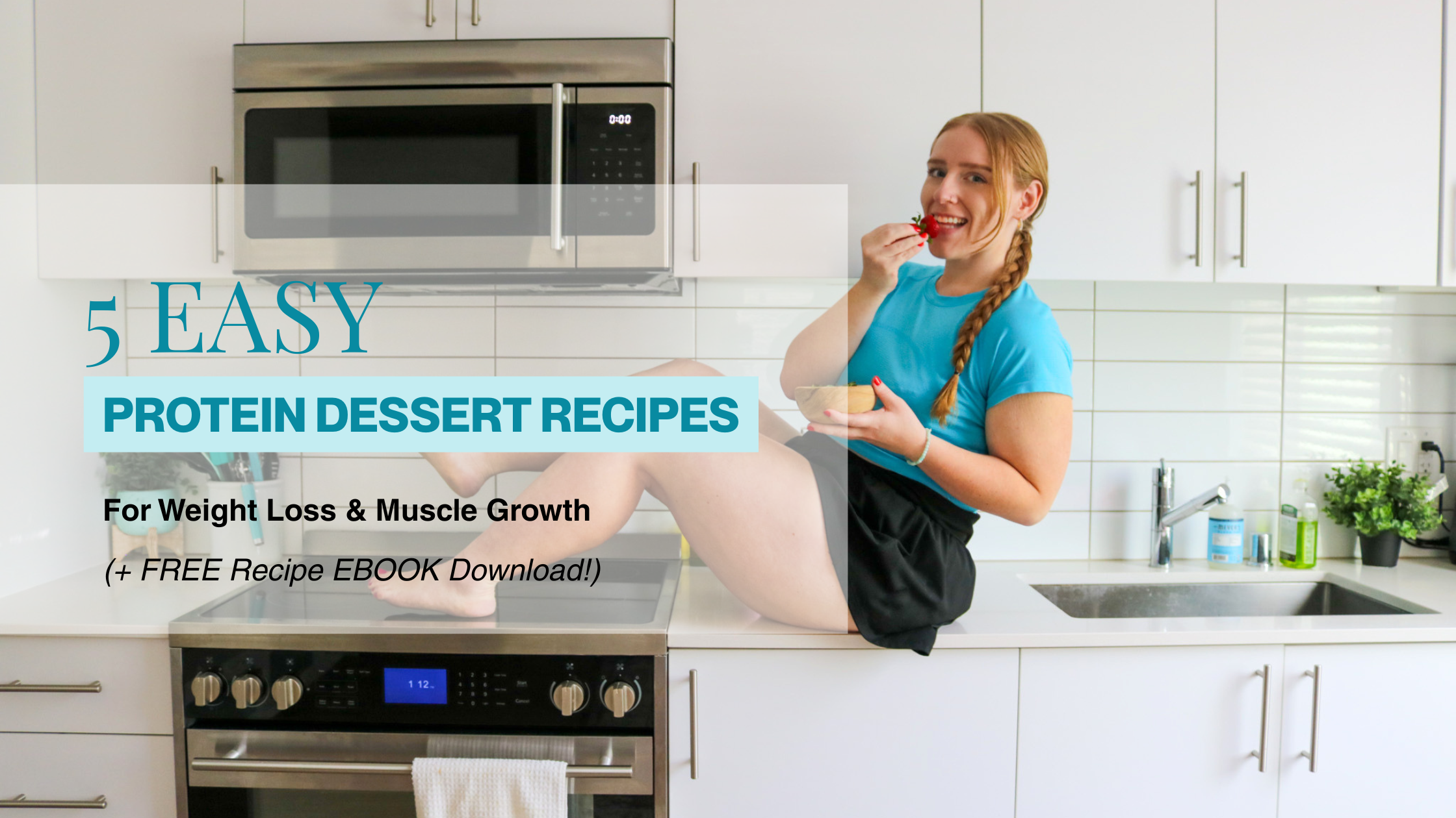 Woman with red hair and a braid wearing a blue shirt and black shorts while eating strawberries on the kitchen counter for her dessert recipe book cover photo.