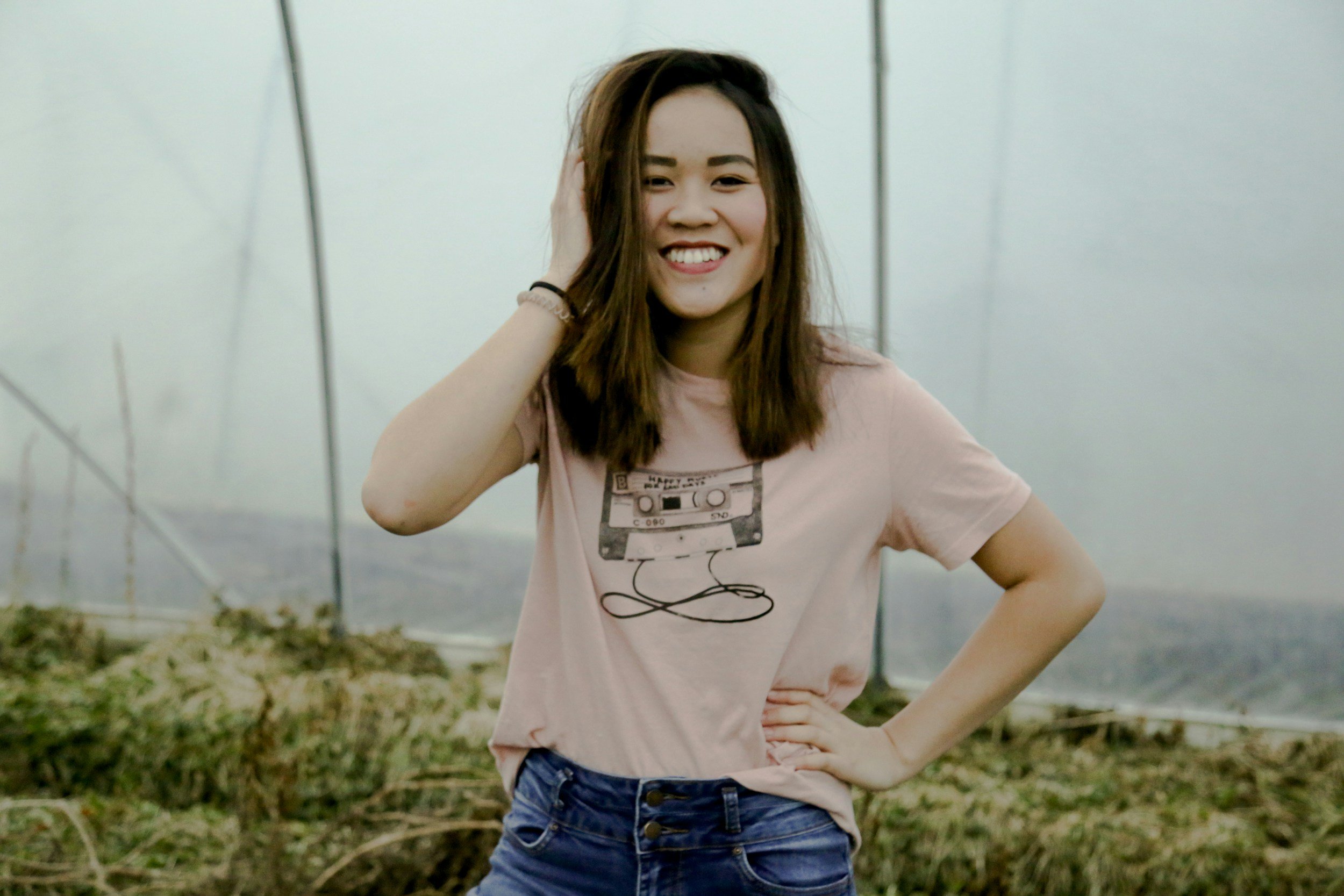 Woman smiling following cervical screening