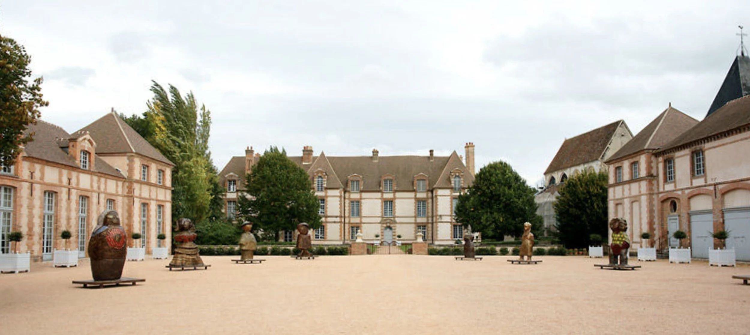 Art exhibition and creative events at a historic French château estate near Paris, France.
