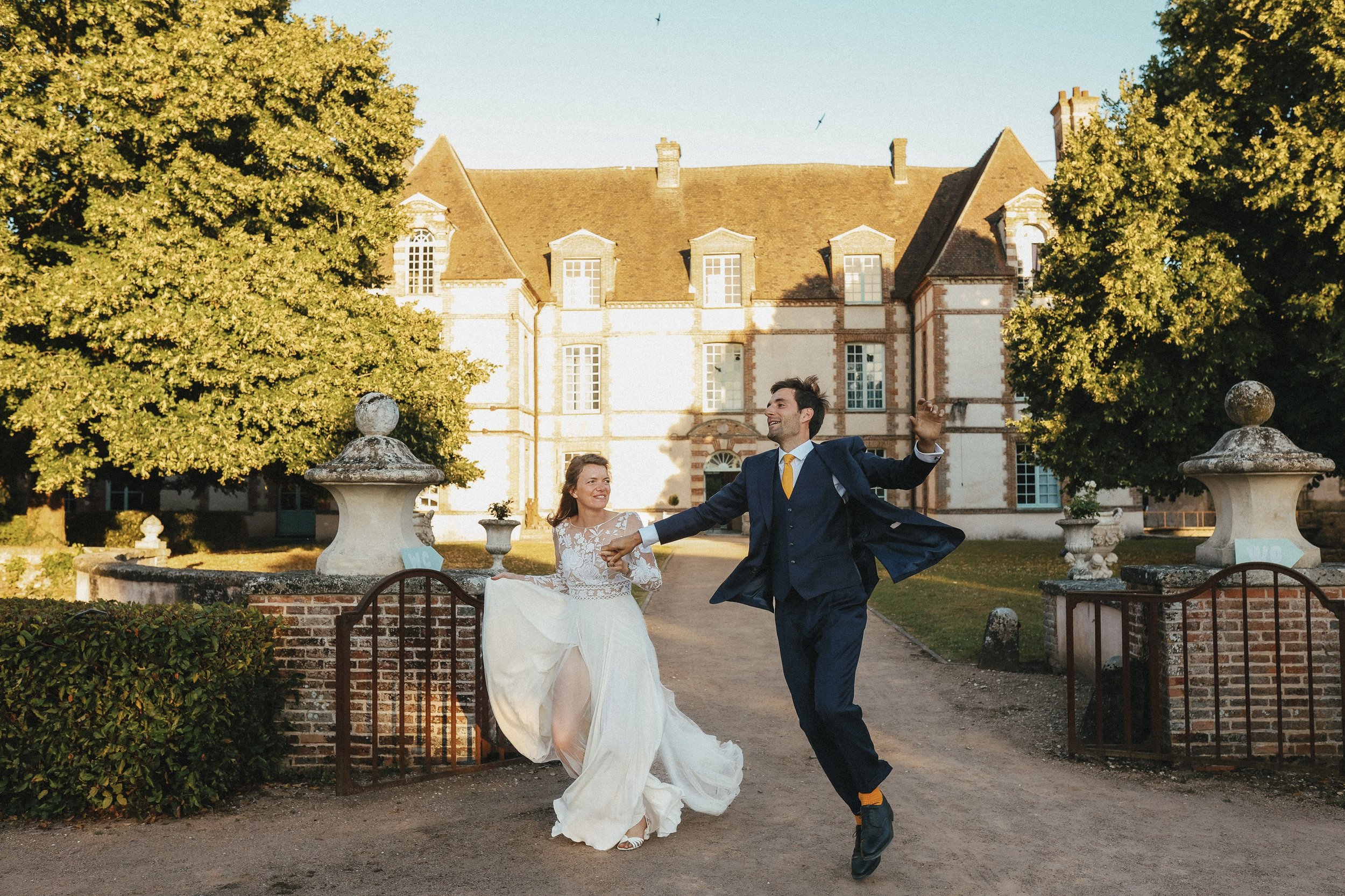 Luxury destination wedding venue in France with elegant outdoor spaces, chapel, castle, courtyard, and more at Château des Joncherets near Paris, France.