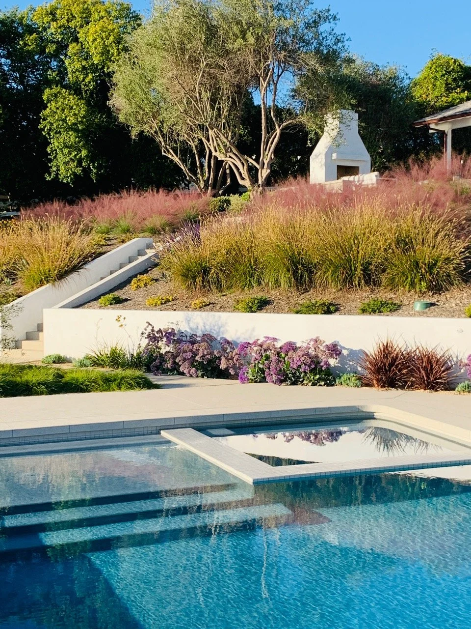 landscape architecture with technology integration, outdoor event space design, adaptive reuse landscaping, landscape projects with live walls, memorial garden design