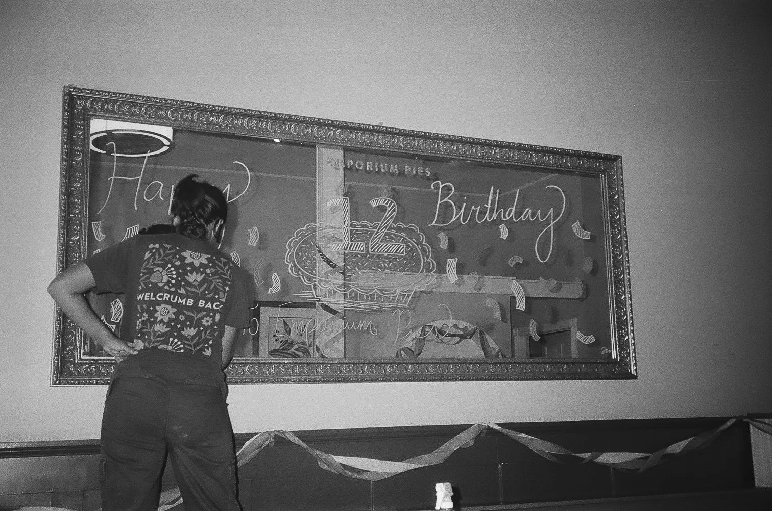 Juni working on another mirror for the shop