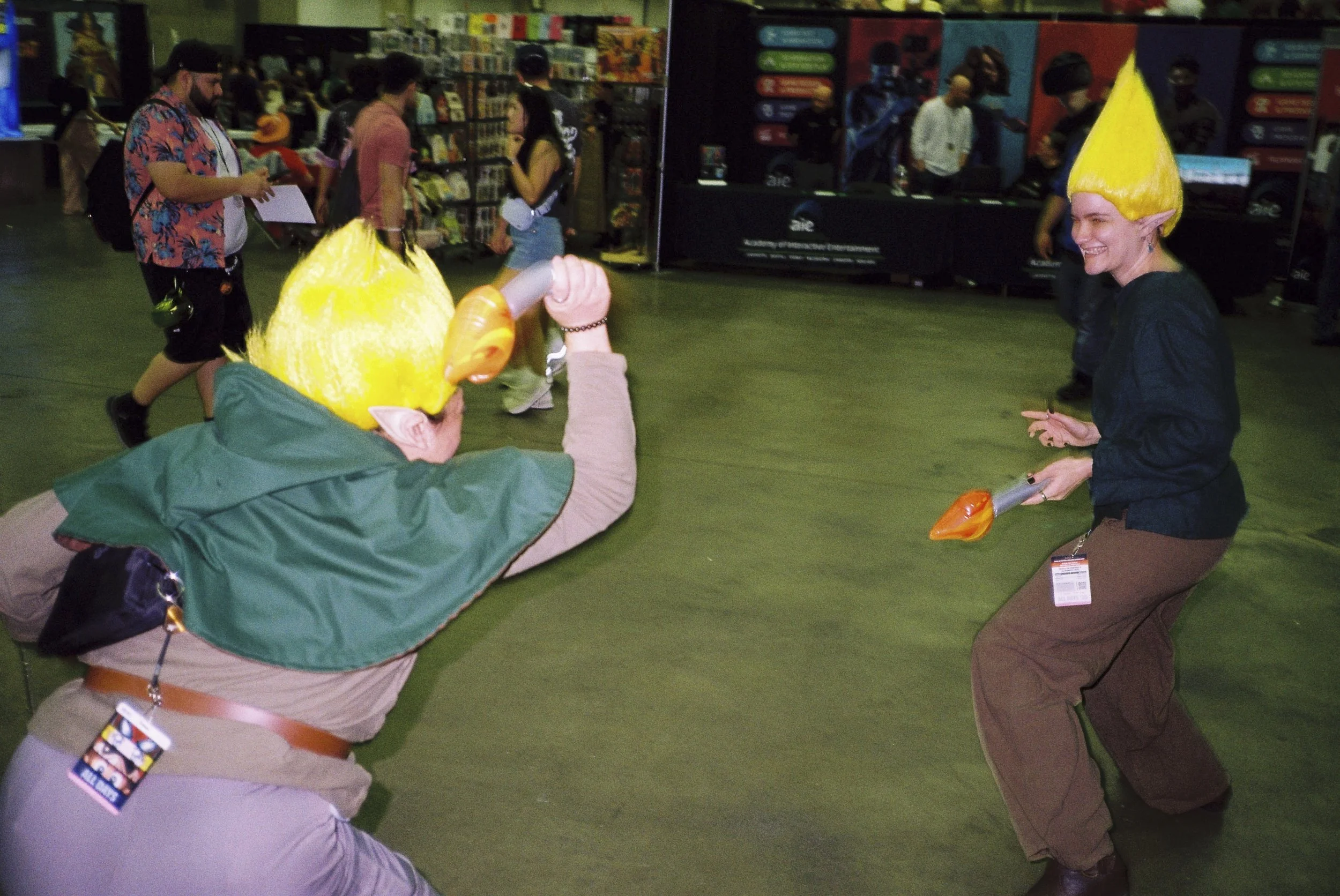Christine and Bri dueling with inflatable torches
