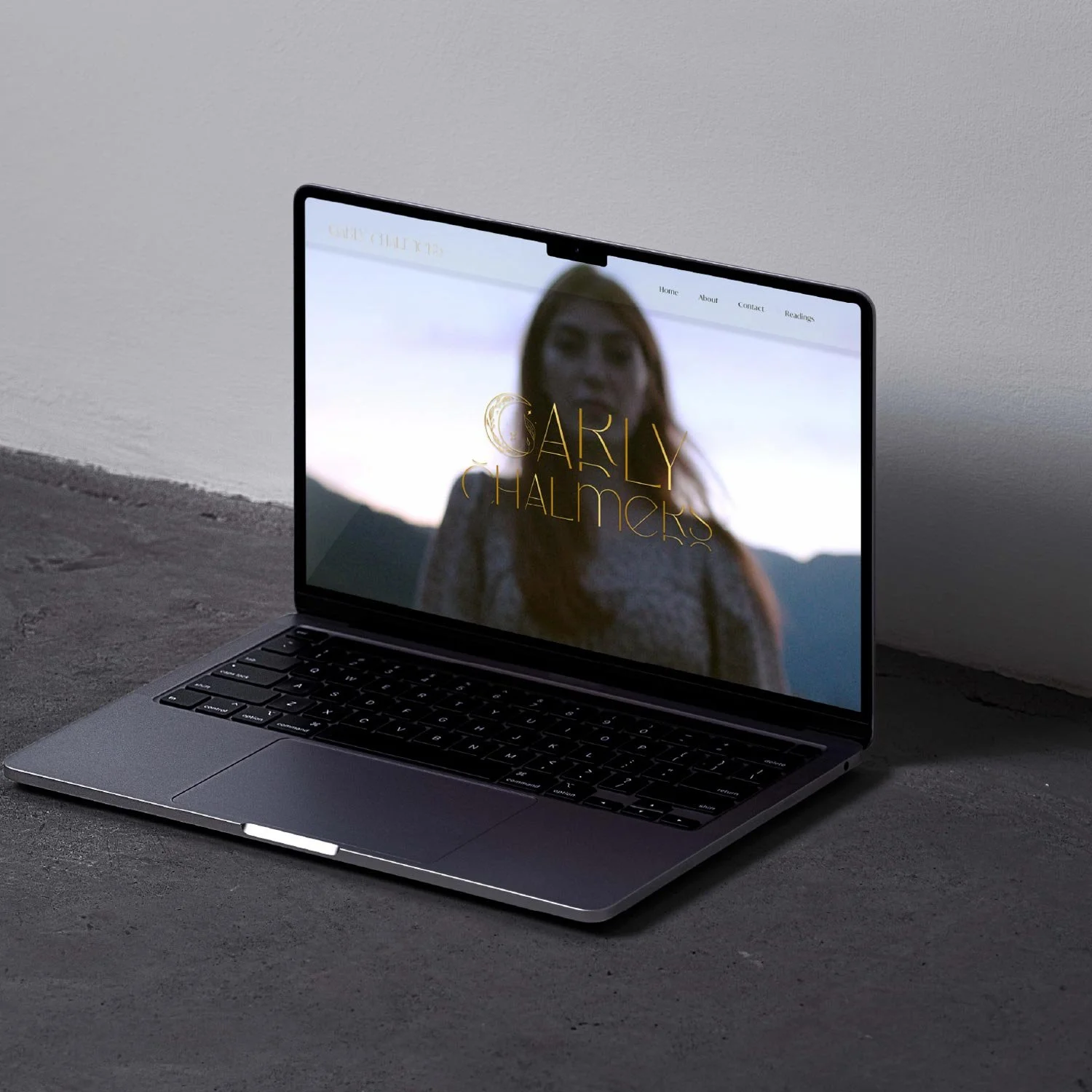 Carly Chalmers web design shown on laptop by Gold Coast web designer Poppy & Seed Studio