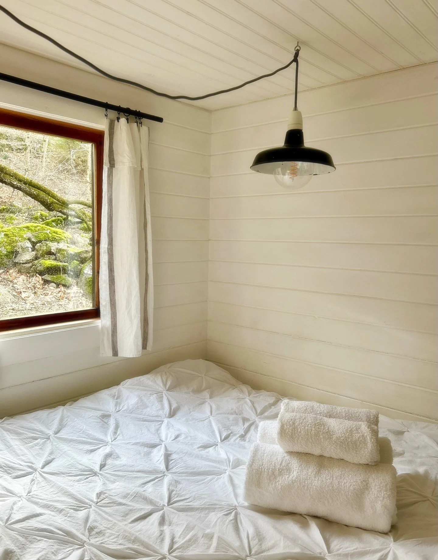 THE RAIN HAS STOPPED// Finally. Our cabin in the woods is cozy.  We sleep in it like a little cocoon&hellip;

Early spring is here. The snowdrops, the deep lilac violets. We open a book, the phone can wait. 
For now the fire remains lit and we enjoy 