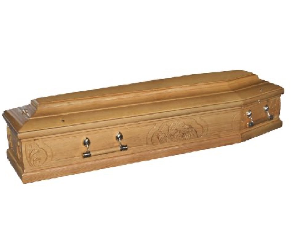 Solid wood casket with carved decorative details.