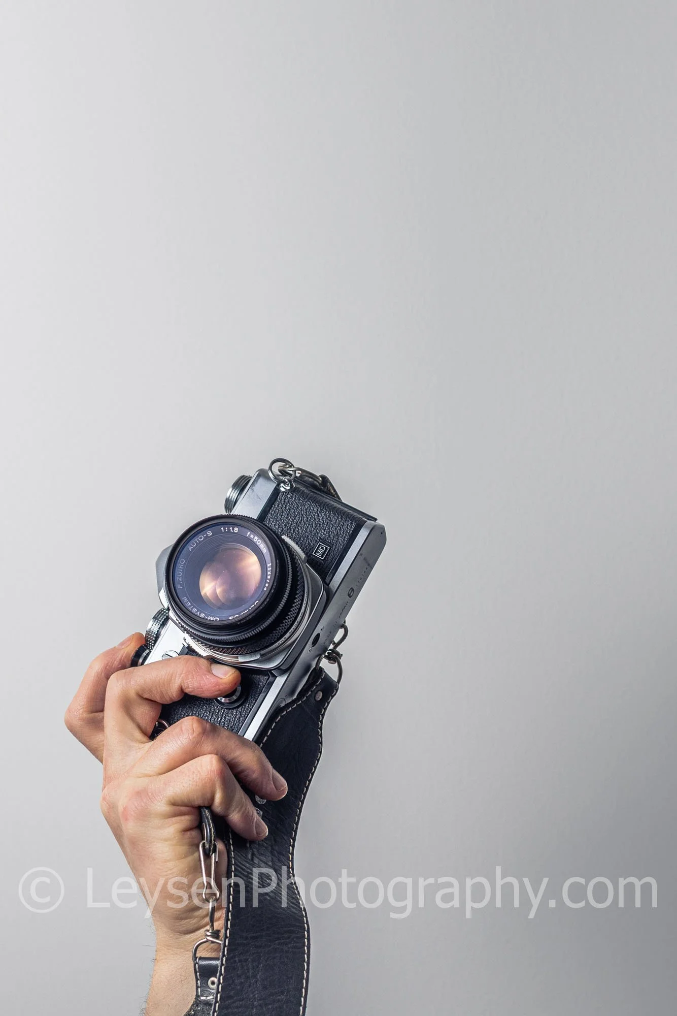 WM-Hand - Camera - Retro - Olympus - negative space00003.jpg