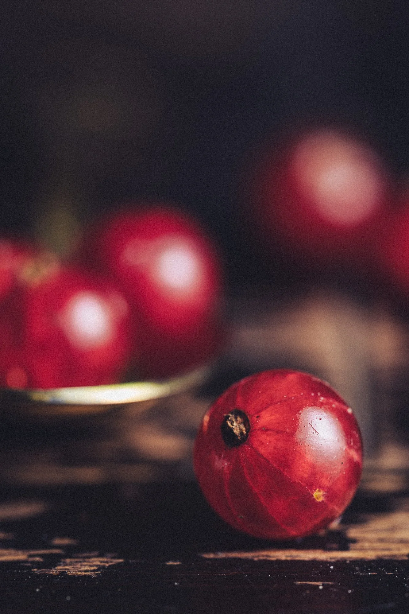 fresh red berries food photography rustic wooden table close up