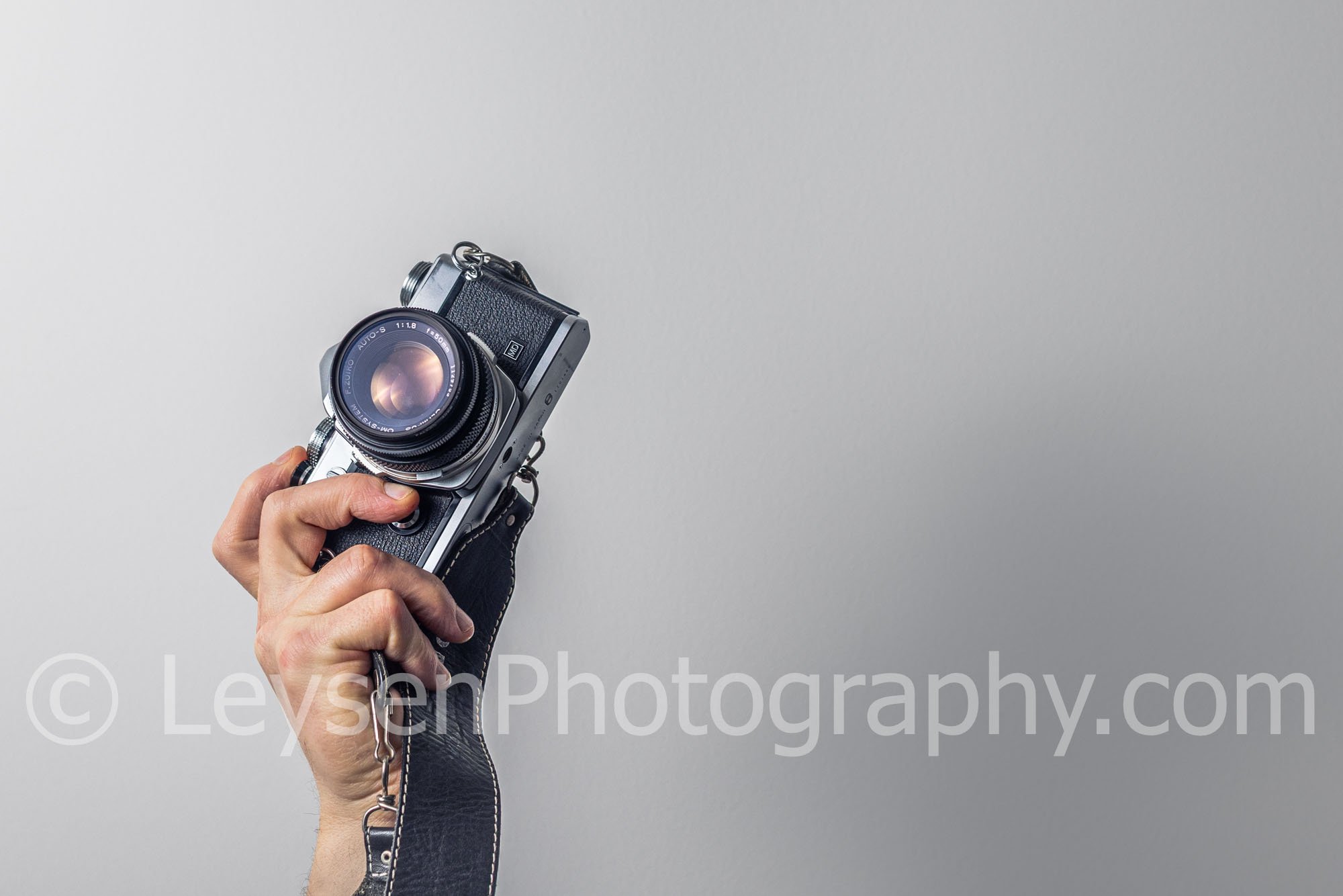 Hand - Camera - Retro - Olympus - negative space-7.jpg