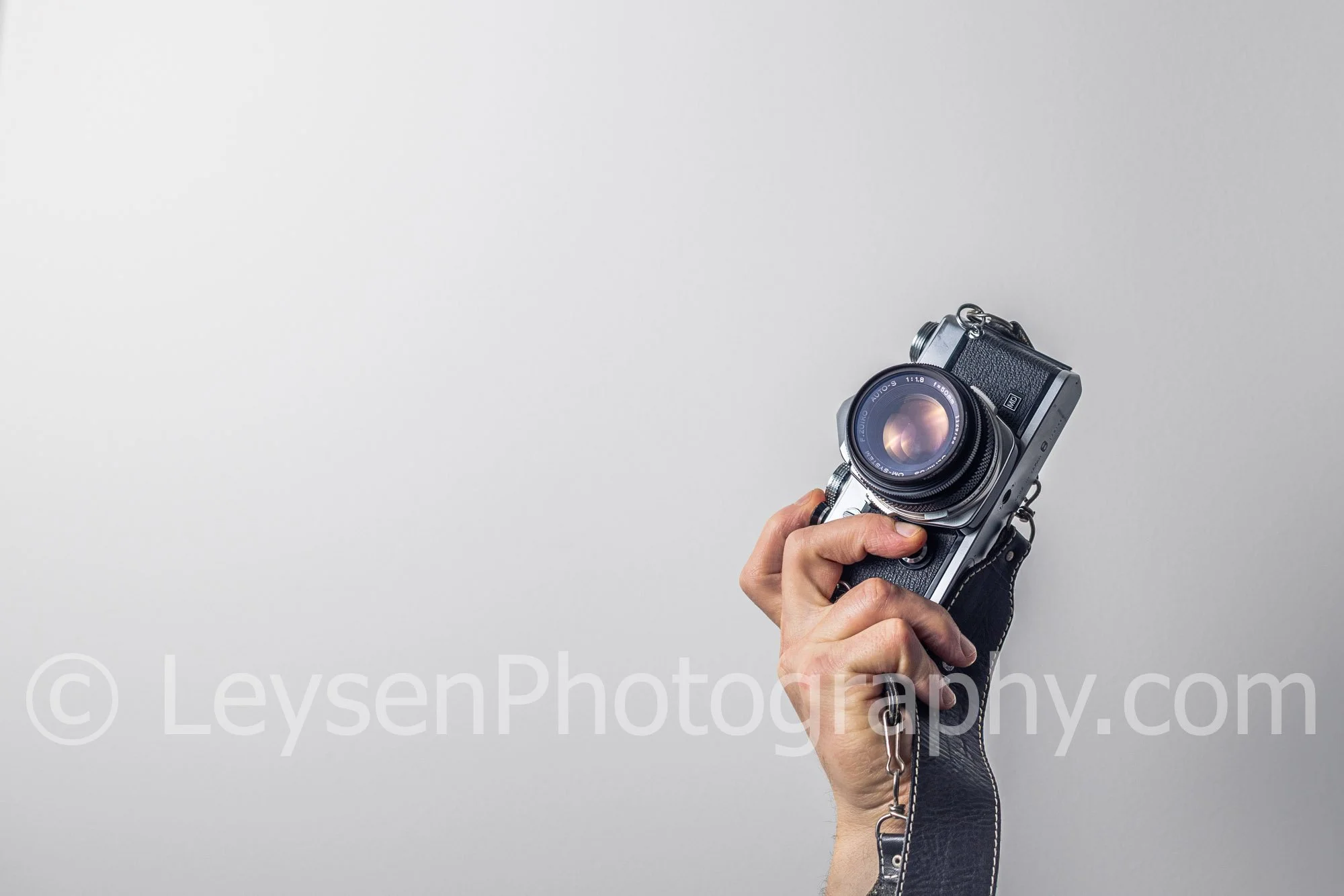 Hand - Camera - Retro - Olympus - negative space-3.jpg