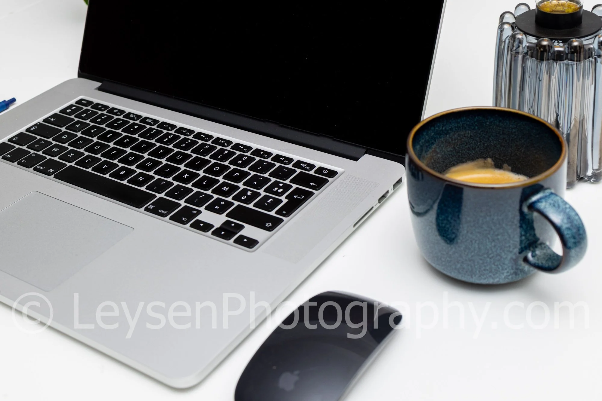 Minimal Laptop Workspace with Coffee and Mouse