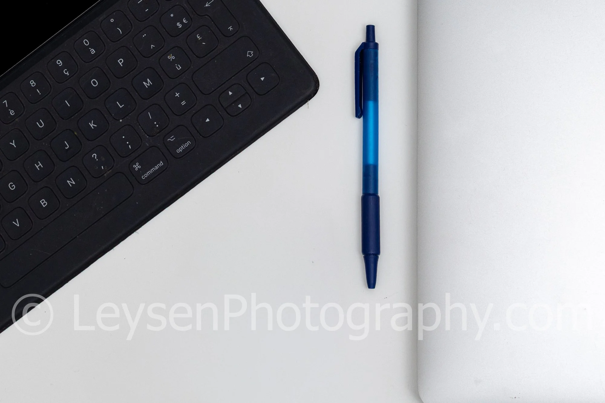 Tablet Keyboard and Blue Pen – Minimal Workspace Desk