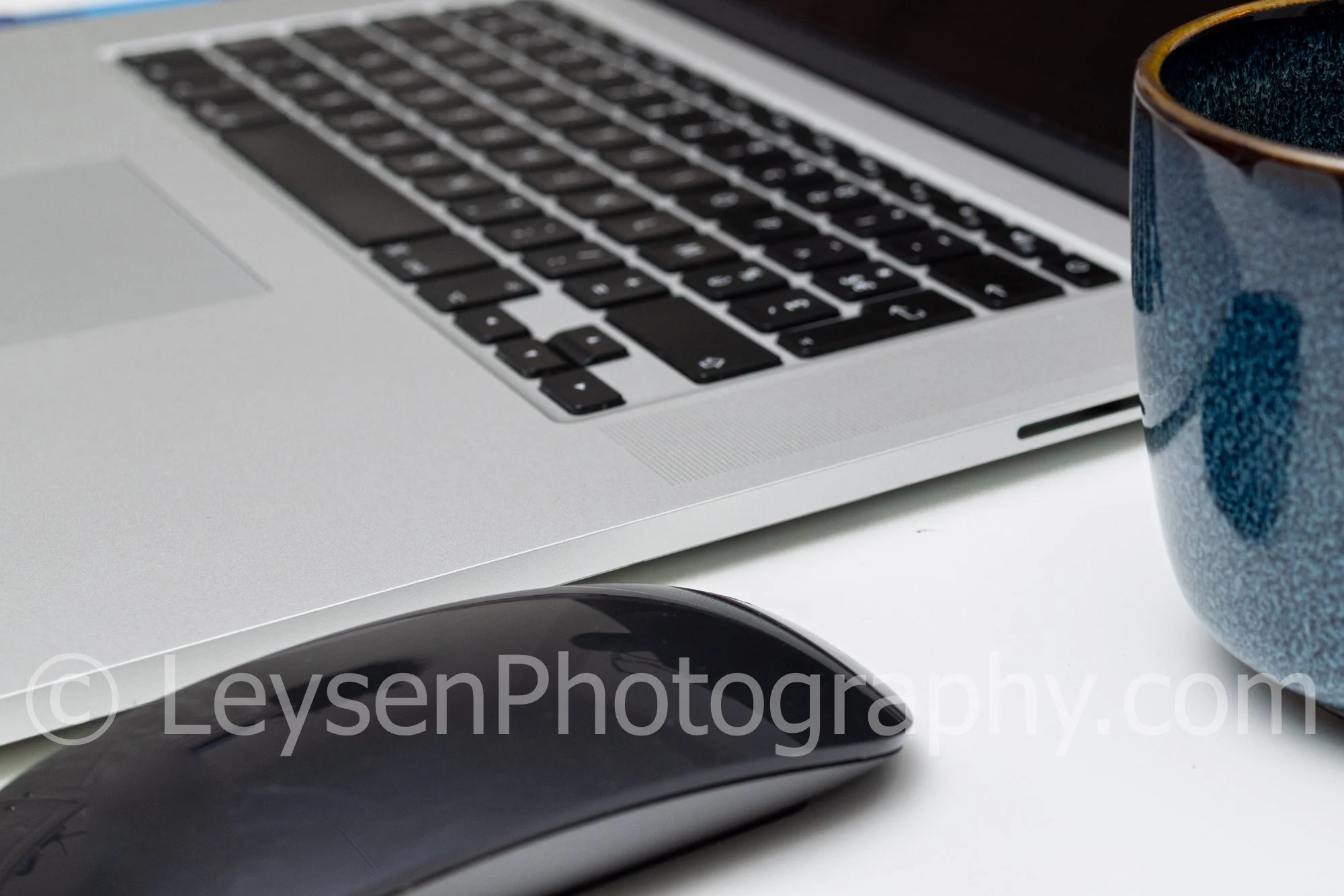 Laptop and Wireless Mouse Workspace – Minimal Business Desk