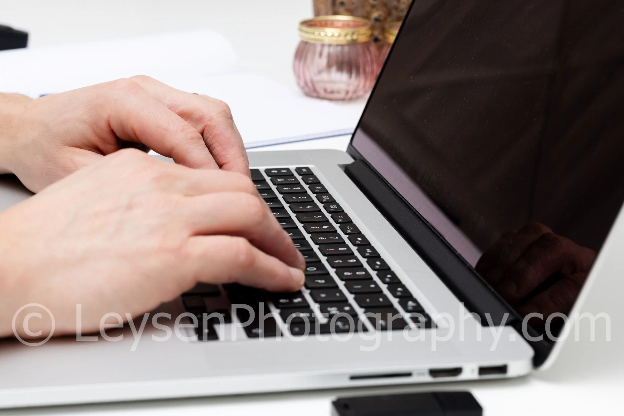 Hands Typing On Laptop Workspace Scene