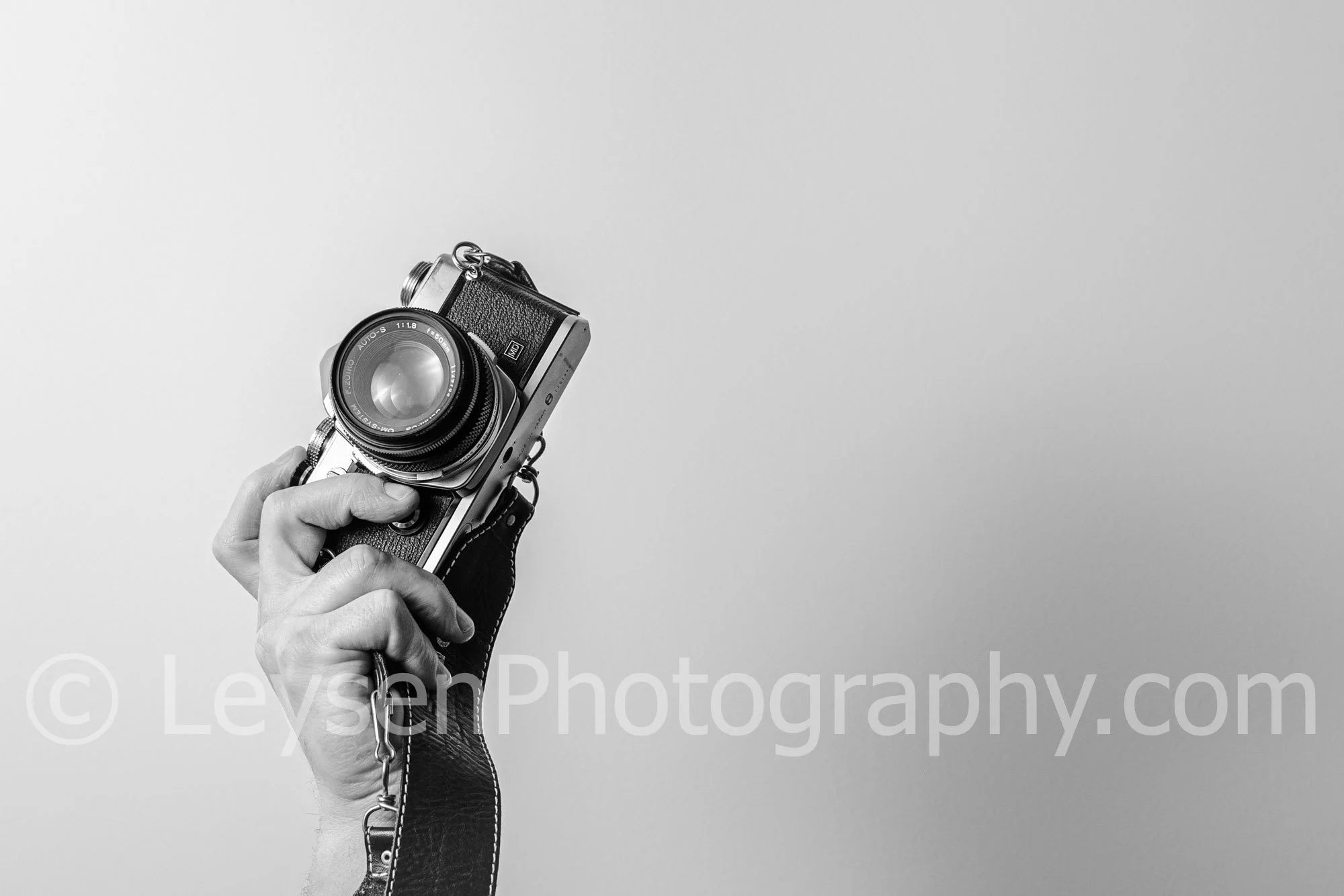 Hand - Camera - Retro - Olympus - negative space-8.jpg